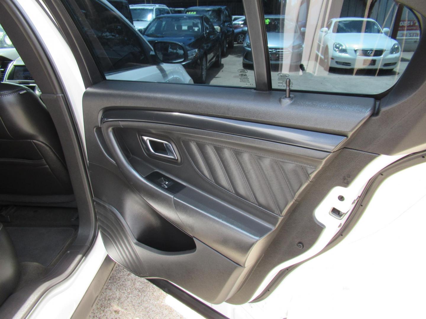 2013 White /Black Ford Taurus SHO AWD (1FAHP2KT8DG) with an 3.5L V6 DOHC 24V engine, 6-Speed Automatic transmission, located at 1511 North Shepherd Dr., Houston, TX, 77008, (281) 657-1221, 29.798361, -95.412560 - 2013 FORD TAURUS SHO VIN: 1FAHP2KT8DG169221 1 F A H P 2 K T 8 D G 1 6 9 2 2 1 SEDAN 4 DR 3.5L V6 F DOHC 16V GASOLINE ALL WHEEL DRIVE - Photo#12
