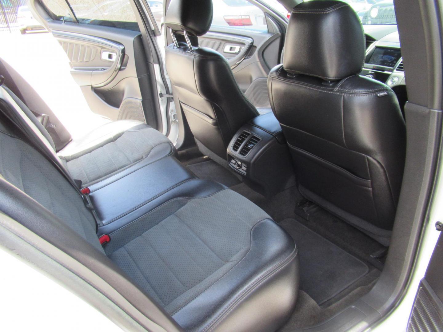 2013 White /Black Ford Taurus SHO AWD (1FAHP2KT8DG) with an 3.5L V6 DOHC 24V engine, 6-Speed Automatic transmission, located at 1511 North Shepherd Dr., Houston, TX, 77008, (281) 657-1221, 29.798361, -95.412560 - 2013 FORD TAURUS SHO VIN: 1FAHP2KT8DG169221 1 F A H P 2 K T 8 D G 1 6 9 2 2 1 SEDAN 4 DR 3.5L V6 F DOHC 16V GASOLINE ALL WHEEL DRIVE - Photo#11
