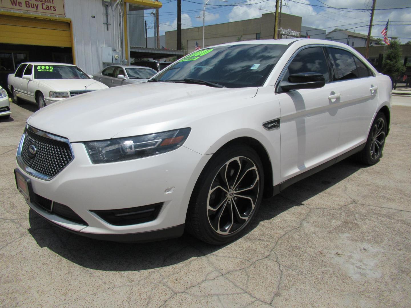 2013 White /Black Ford Taurus SHO AWD (1FAHP2KT8DG) with an 3.5L V6 DOHC 24V engine, 6-Speed Automatic transmission, located at 1511 North Shepherd Dr., Houston, TX, 77008, (281) 657-1221, 29.798361, -95.412560 - 2013 FORD TAURUS SHO VIN: 1FAHP2KT8DG169221 1 F A H P 2 K T 8 D G 1 6 9 2 2 1 SEDAN 4 DR 3.5L V6 F DOHC 16V GASOLINE ALL WHEEL DRIVE - Photo#23