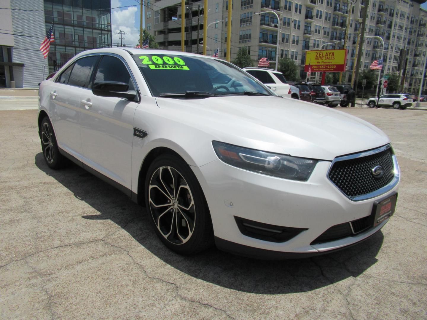 2013 White /Black Ford Taurus SHO AWD (1FAHP2KT8DG) with an 3.5L V6 DOHC 24V engine, 6-Speed Automatic transmission, located at 1511 North Shepherd Dr., Houston, TX, 77008, (281) 657-1221, 29.798361, -95.412560 - 2013 FORD TAURUS SHO VIN: 1FAHP2KT8DG169221 1 F A H P 2 K T 8 D G 1 6 9 2 2 1 SEDAN 4 DR 3.5L V6 F DOHC 16V GASOLINE ALL WHEEL DRIVE - Photo#22