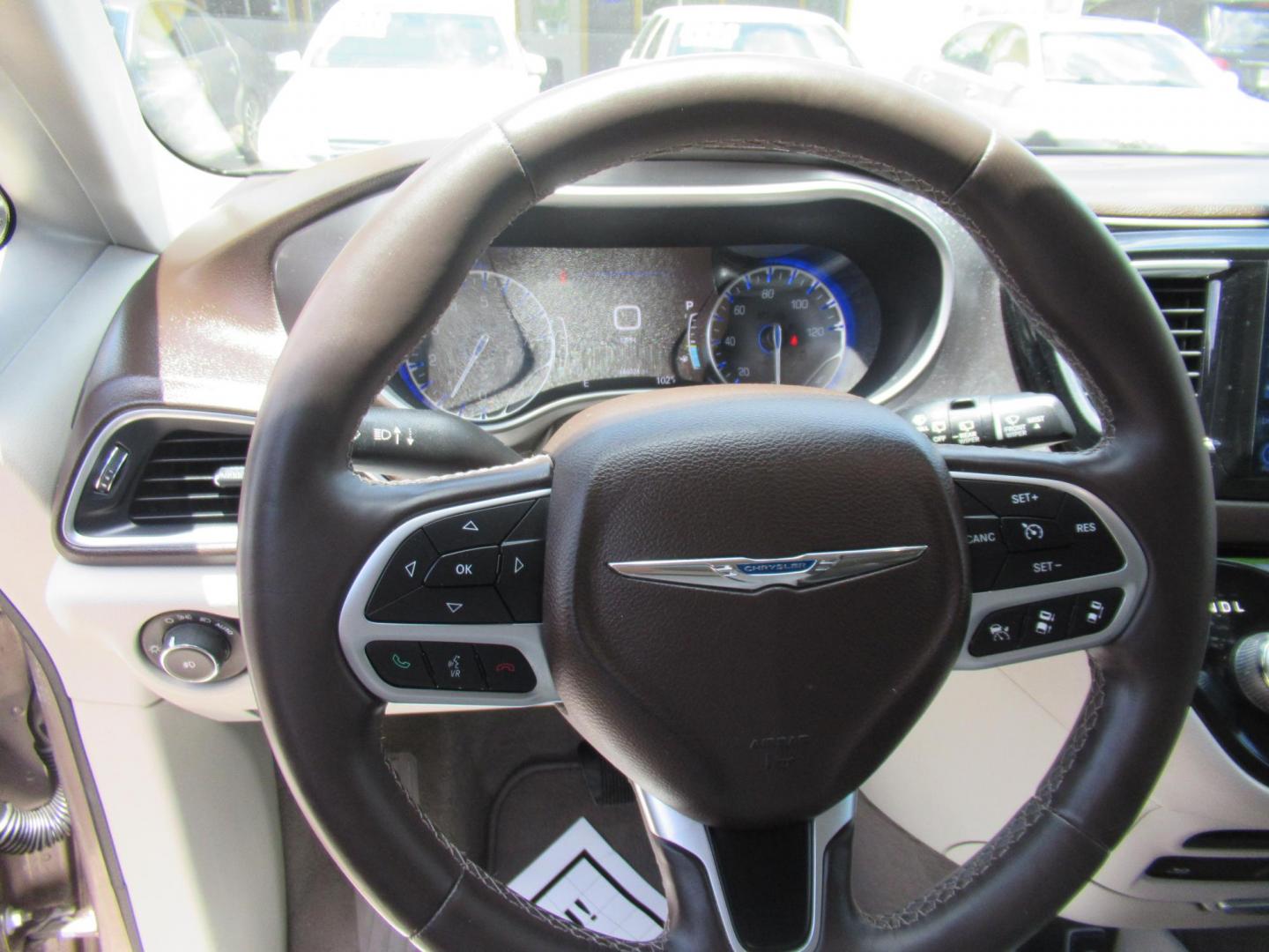 2017 Gold /Gray Chrysler Pacifica Touring-L Plus (2C4RC1EG5HR) with an 3.6L V6 DOHC 24V engine, 9A transmission, located at 1511 North Shepherd Dr., Houston, TX, 77008, (281) 657-1221, 29.798361, -95.412560 - 2017 CHRYSLER PACIFICA TOURING-L PLUS VIN: 2C4RC1EG5HR559653 2 C 4 R C 1 E G 5 H R 5 5 9 6 5 3 VAN 3.6L V6 F DOHC 24V GASOLINE FRONT WHEEL DRIVE - Photo#3
