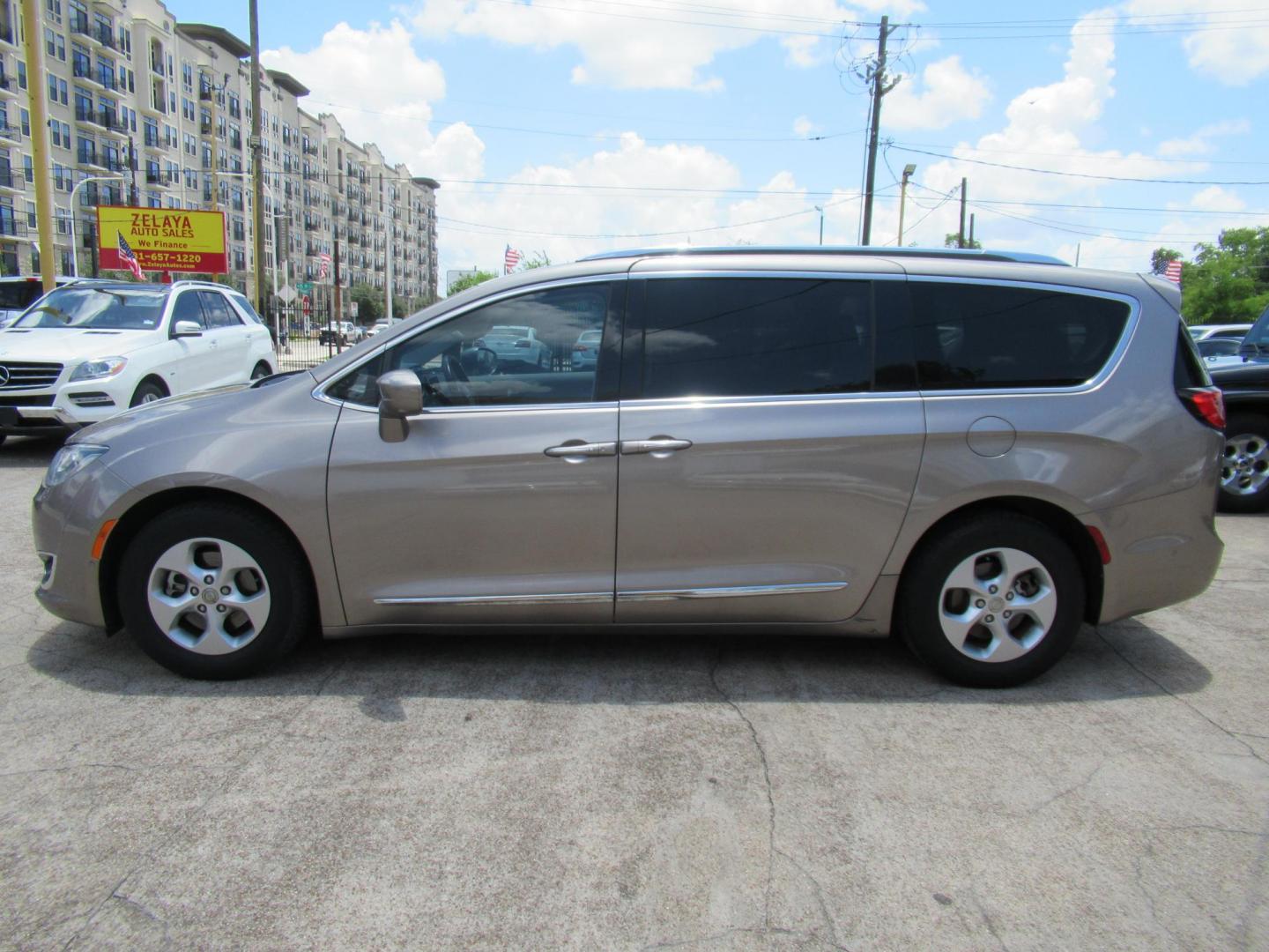 2017 Gold /Gray Chrysler Pacifica Touring-L Plus (2C4RC1EG5HR) with an 3.6L V6 DOHC 24V engine, 9A transmission, located at 1511 North Shepherd Dr., Houston, TX, 77008, (281) 657-1221, 29.798361, -95.412560 - 2017 CHRYSLER PACIFICA TOURING-L PLUS VIN: 2C4RC1EG5HR559653 2 C 4 R C 1 E G 5 H R 5 5 9 6 5 3 VAN 3.6L V6 F DOHC 24V GASOLINE FRONT WHEEL DRIVE - Photo#27