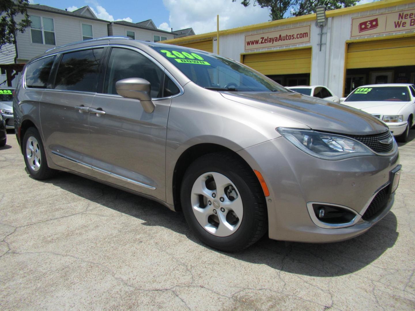 2017 Gold /Gray Chrysler Pacifica Touring-L Plus (2C4RC1EG5HR) with an 3.6L V6 DOHC 24V engine, 9A transmission, located at 1511 North Shepherd Dr., Houston, TX, 77008, (281) 657-1221, 29.798361, -95.412560 - 2017 CHRYSLER PACIFICA TOURING-L PLUS VIN: 2C4RC1EG5HR559653 2 C 4 R C 1 E G 5 H R 5 5 9 6 5 3 VAN 3.6L V6 F DOHC 24V GASOLINE FRONT WHEEL DRIVE - Photo#30