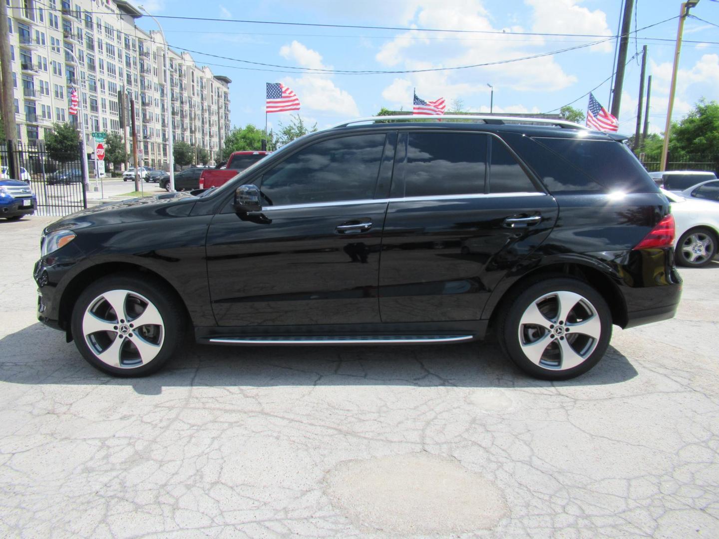 2018 Black /Tan Mercedes-Benz GLE-Class GLE350 4MATIC (4JGDA5HB2JB) with an 3.5L V6 DOHC 24V engine, 7A transmission, located at 1511 North Shepherd Dr., Houston, TX, 77008, (281) 657-1221, 29.798361, -95.412560 - 2018 MERCEDES-BENZ GLE 350 4MATIC VIN: 4JGDA5HB2JB040860 4 J G D A 5 H B 2 J B 0 4 0 8 6 0 4 DOOR WAGON/SPORT UTILITY 3.5L V6 F DOHC 24V GASOLINE ALL WHEEL DRIVE - Photo#31