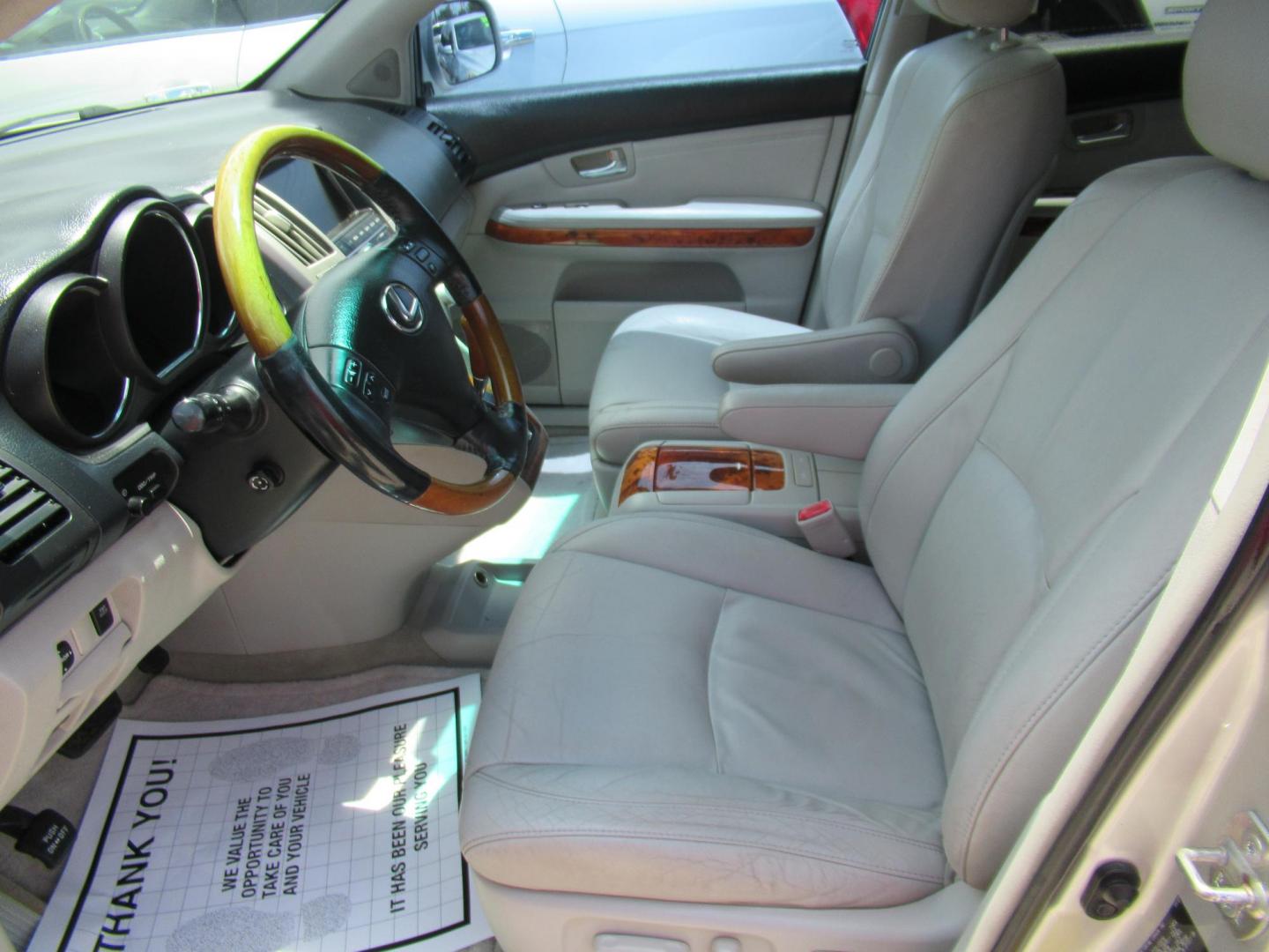 2008 Gold /Tan Lexus RX 350 FWD (2T2GK31U58C) with an 3.5L V6 DOHC 24V engine, Automatic Overdrive transmission, located at 1511 North Shepherd Dr., Houston, TX, 77008, (281) 657-1221, 29.798361, -95.412560 - 2008 LEXUS RX 350 VIN: 2T2GK31U58C050658 2 T 2 G K 3 1 U 5 8 C 0 5 0 6 5 8 4 DOOR WAGON/SPORT UTILITY 3.5L V6 F DOHC 24V GASOLINE FRONT WHEEL DRIVE - Photo#2