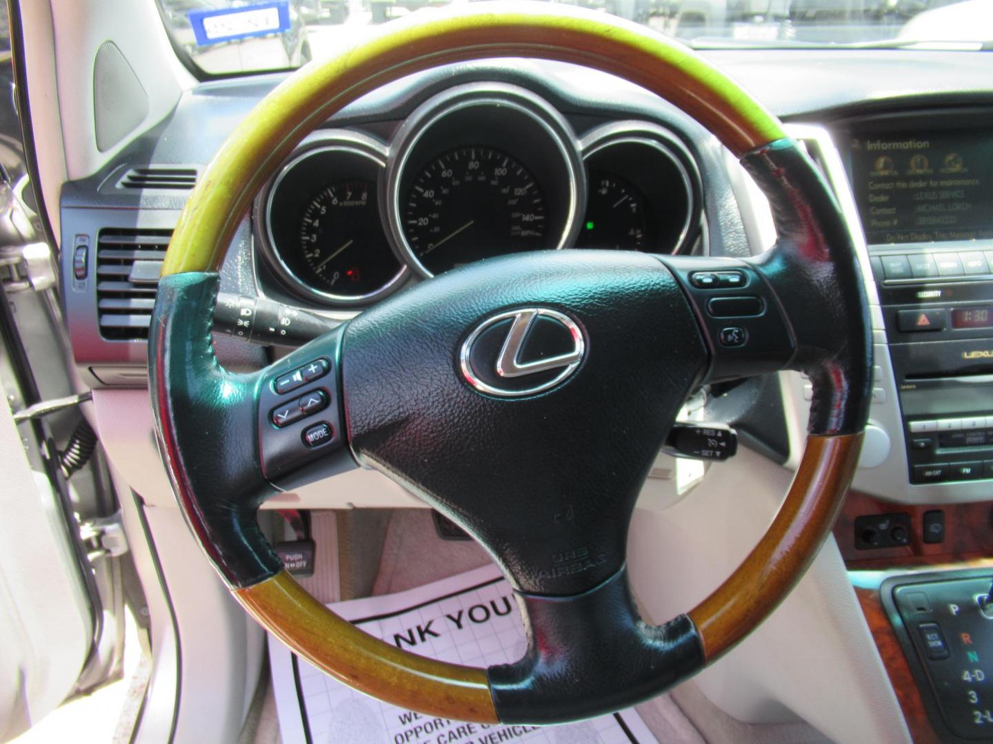 2008 Gold /Tan Lexus RX 350 FWD (2T2GK31U58C) with an 3.5L V6 DOHC 24V engine, Automatic Overdrive transmission, located at 1511 North Shepherd Dr., Houston, TX, 77008, (281) 657-1221, 29.798361, -95.412560 - 2008 LEXUS RX 350 VIN: 2T2GK31U58C050658 2 T 2 G K 3 1 U 5 8 C 0 5 0 6 5 8 4 DOOR WAGON/SPORT UTILITY 3.5L V6 F DOHC 24V GASOLINE FRONT WHEEL DRIVE - Photo#3