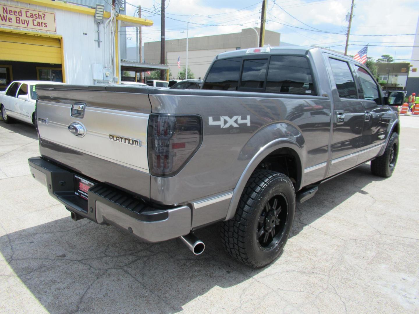2014 Gray /Black Ford F-150 FX4 SuperCrew 5.5-ft. Bed 4WD (1FTFW1ET8EF) with an 3.5L V6 TURBO engine, Automatic transmission, located at 1511 North Shepherd Dr., Houston, TX, 77008, (281) 657-1221, 29.798361, -95.412560 - 2014 FORD F-150 PLATINUM VIN: 1FTFW1ET8EFA38064 1 F T F W 1 E T 8 E F A 3 8 0 6 4 CREW PICKUP 3.5L V6 F DOHC 24V GASOLINE REAR WHEEL DRIVE W/ 4X4 - Photo#29
