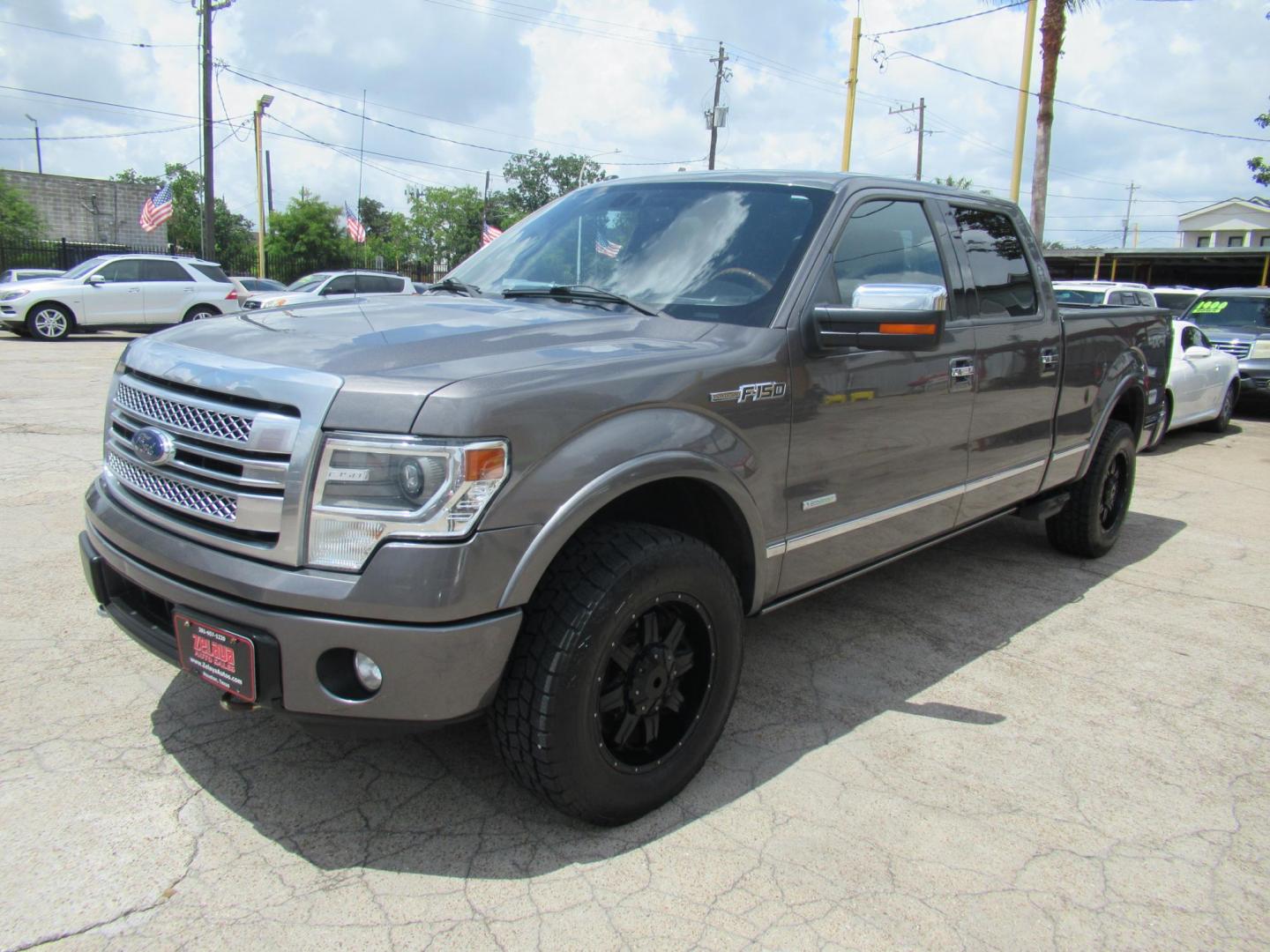 2014 Gray /Black Ford F-150 FX4 SuperCrew 5.5-ft. Bed 4WD (1FTFW1ET8EF) with an 3.5L V6 TURBO engine, Automatic transmission, located at 1511 North Shepherd Dr., Houston, TX, 77008, (281) 657-1221, 29.798361, -95.412560 - 2014 FORD F-150 PLATINUM VIN: 1FTFW1ET8EFA38064 1 F T F W 1 E T 8 E F A 3 8 0 6 4 CREW PICKUP 3.5L V6 F DOHC 24V GASOLINE REAR WHEEL DRIVE W/ 4X4 - Photo#33