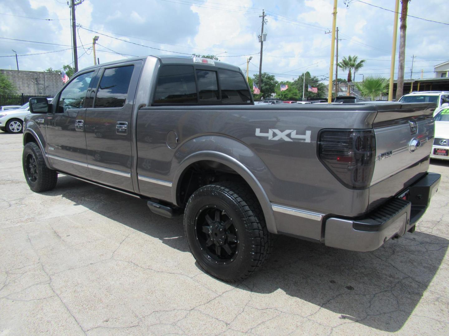 2014 Gray /Black Ford F-150 FX4 SuperCrew 5.5-ft. Bed 4WD (1FTFW1ET8EF) with an 3.5L V6 TURBO engine, Automatic transmission, located at 1511 North Shepherd Dr., Houston, TX, 77008, (281) 657-1221, 29.798361, -95.412560 - 2014 FORD F-150 PLATINUM VIN: 1FTFW1ET8EFA38064 1 F T F W 1 E T 8 E F A 3 8 0 6 4 CREW PICKUP 3.5L V6 F DOHC 24V GASOLINE REAR WHEEL DRIVE W/ 4X4 - Photo#35