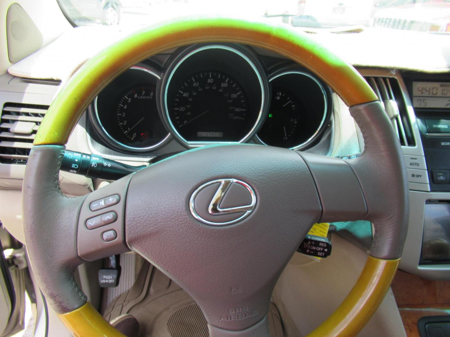 2004 Gold /Tan Lexus RX 330 2WD (JTJGA31U740) with an 3.3L V6 DOHC 24V engine, Automatic Overdrive transmission, located at 1511 North Shepherd Dr., Houston, TX, 77008, (281) 657-1221, 29.798361, -95.412560 - 2004 LEXUS RX 330 VIN: JTJGA31U740028251 J T J G A 3 1 U 7 4 0 0 2 8 2 5 1 4 DOOR WAGON/SPORT UTILITY 3.3L V6 F 24V GASOLINE FRONT WHEEL DRIVE - Photo#2