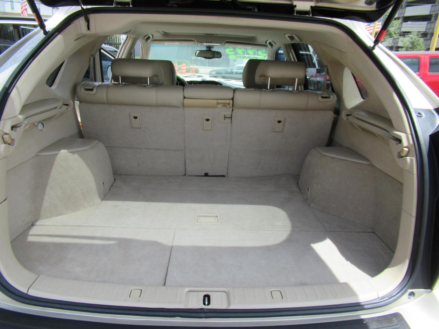 2004 Gold /Tan Lexus RX 330 2WD (JTJGA31U740) with an 3.3L V6 DOHC 24V engine, Automatic Overdrive transmission, located at 1511 North Shepherd Dr., Houston, TX, 77008, (281) 657-1221, 29.798361, -95.412560 - 2004 LEXUS RX 330 VIN: JTJGA31U740028251 J T J G A 3 1 U 7 4 0 0 2 8 2 5 1 4 DOOR WAGON/SPORT UTILITY 3.3L V6 F 24V GASOLINE FRONT WHEEL DRIVE - Photo#9