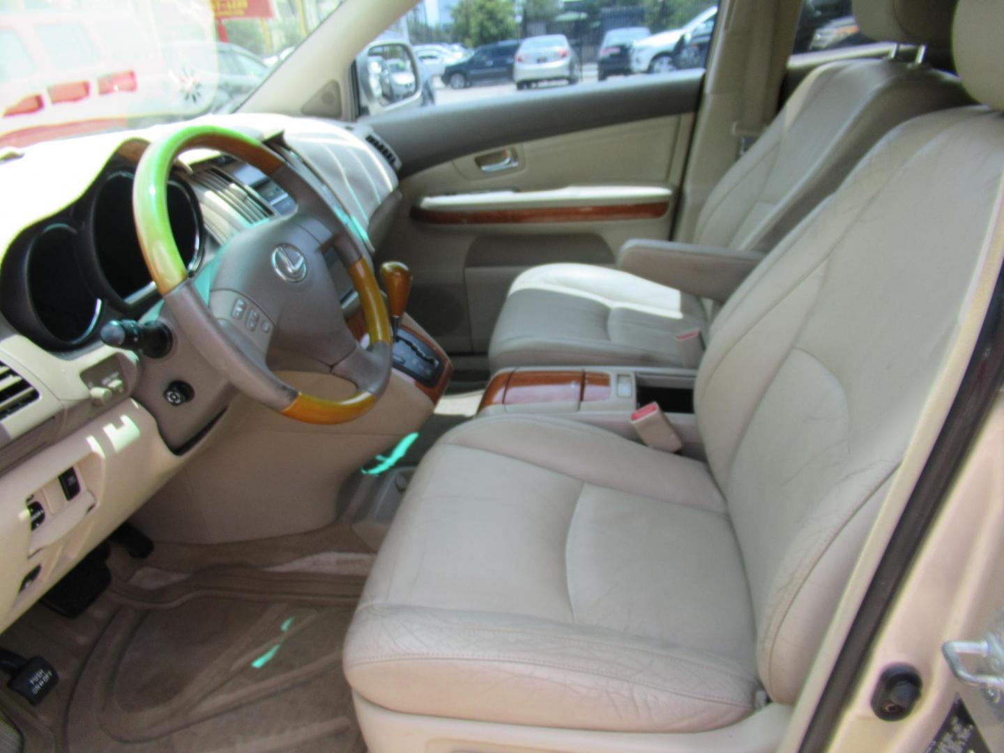 2004 Gold /Tan Lexus RX 330 2WD (JTJGA31U740) with an 3.3L V6 DOHC 24V engine, Automatic Overdrive transmission, located at 1511 North Shepherd Dr., Houston, TX, 77008, (281) 657-1221, 29.798361, -95.412560 - 2004 LEXUS RX 330 VIN: JTJGA31U740028251 J T J G A 3 1 U 7 4 0 0 2 8 2 5 1 4 DOOR WAGON/SPORT UTILITY 3.3L V6 F 24V GASOLINE FRONT WHEEL DRIVE - Photo#13