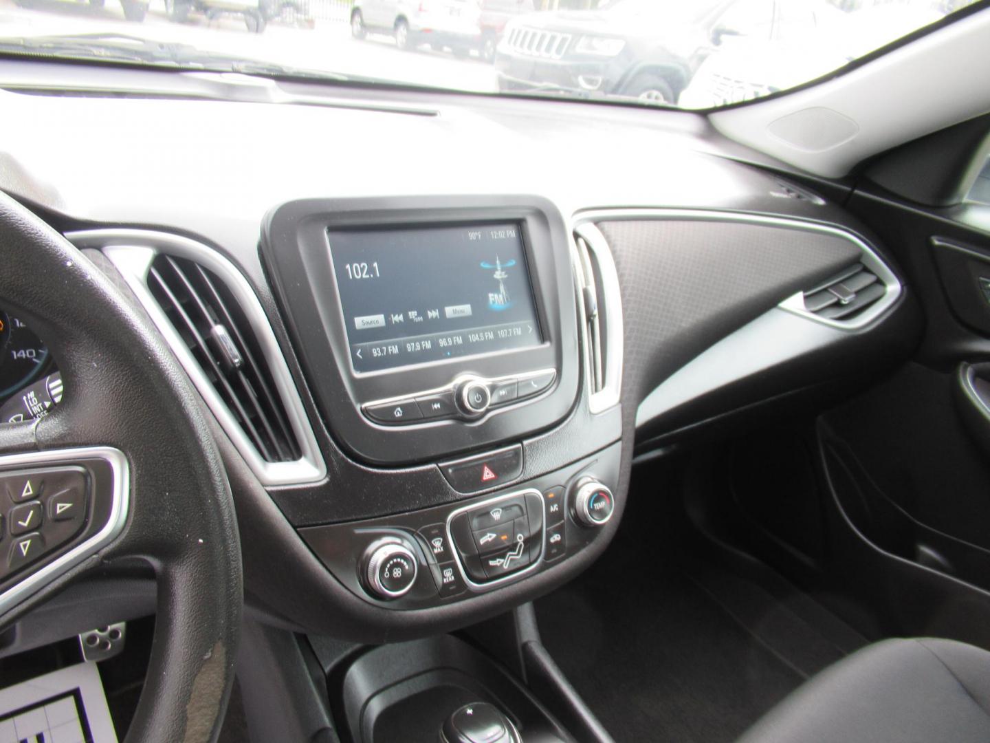 2016 Silver /Black Chevrolet Malibu LS (1G1ZB5ST0GF) with an 1.5L L4 DOHC 16V engine, 6A transmission, located at 1511 North Shepherd Dr., Houston, TX, 77008, (281) 657-1221, 29.798361, -95.412560 - 2016 CHEVROLET MALIBU LS VIN: 1G1ZB5ST0GF347074 1 G 1 Z B 5 S T 0 G F 3 4 7 0 7 4 SEDAN 4 DR 1.5L I4 F DOHC 16V GASOLINE FRONT WHEEL DRIVE - Photo#4