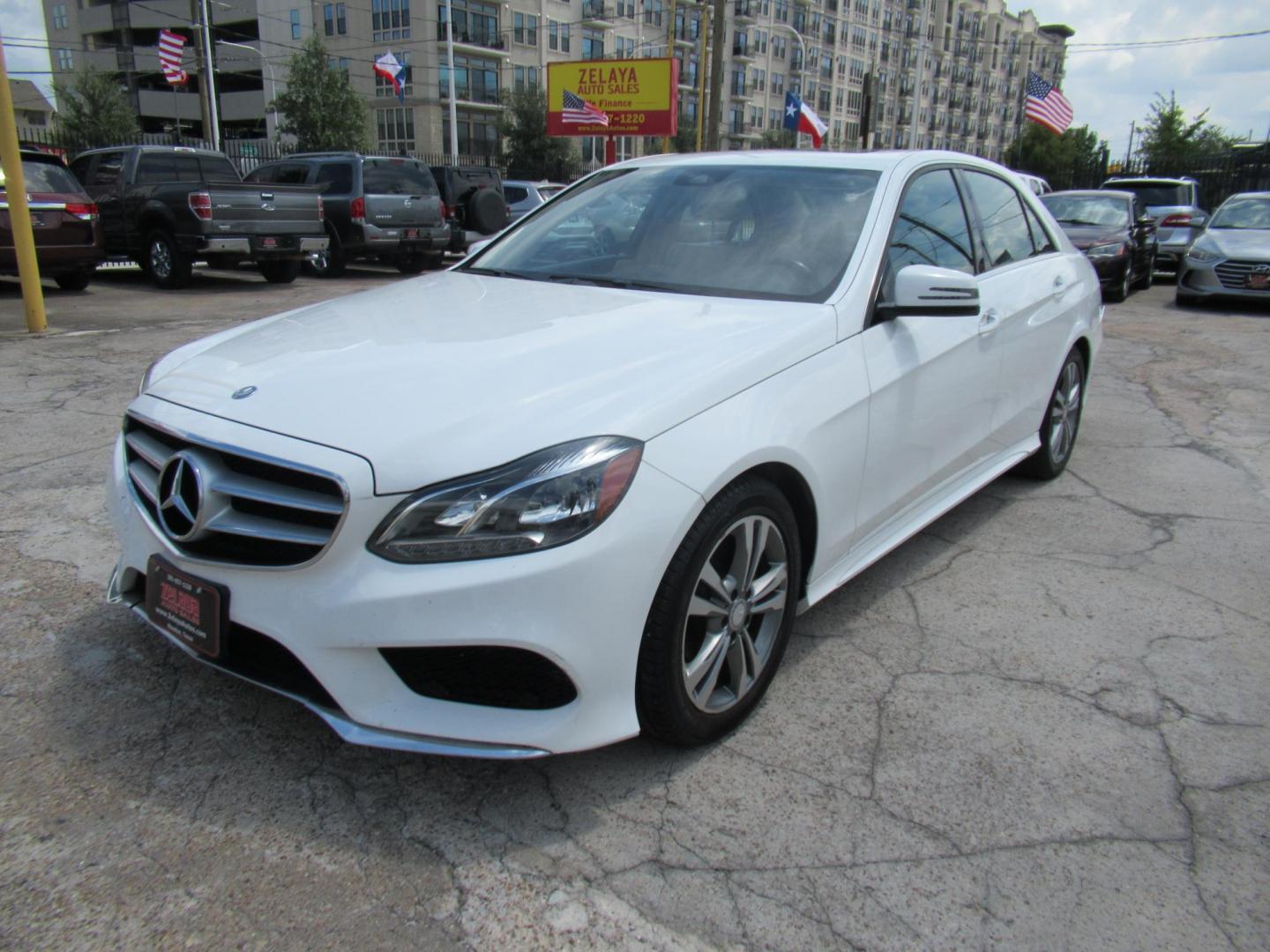 2015 White /Tan Mercedes-Benz E-Class E350 Sport Sedan (WDDHF5KBXFB) with an 3.5L V6 DOHC 24V engine, Automatic transmission, located at 1511 North Shepherd Dr., Houston, TX, 77008, (281) 657-1221, 29.798361, -95.412560 - 2015 MERCEDES-BENZ E-CLASS E 350 VIN: WDDHF5KBXFB117102 W D D H F 5 K B X F B 1 1 7 1 0 2 SEDAN 4 DR 3.5L V6 F DOHC 24V GASOLINE REAR WHEEL DRIVE - Photo#13