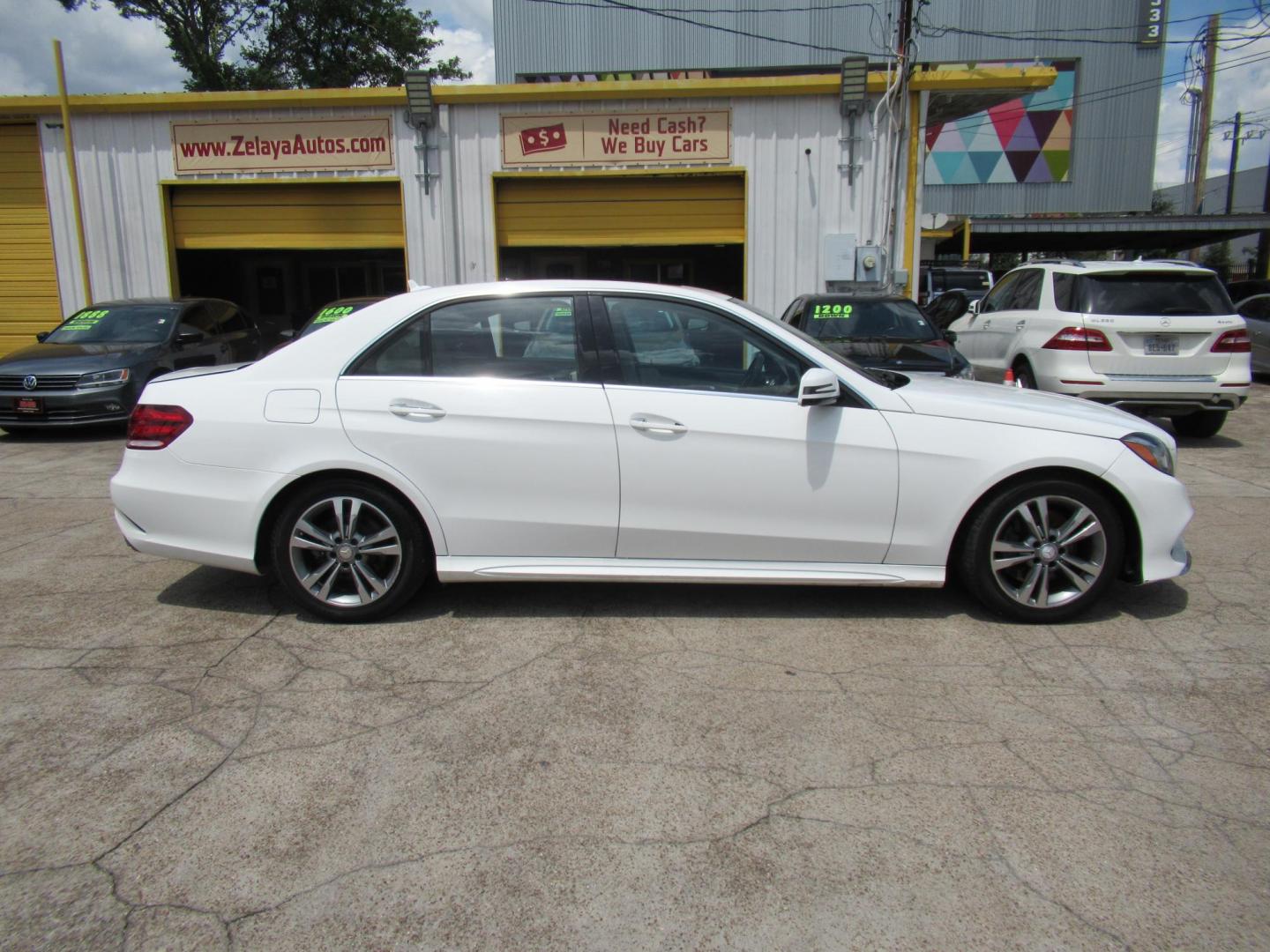 2015 White /Tan Mercedes-Benz E-Class E350 Sport Sedan (WDDHF5KBXFB) with an 3.5L V6 DOHC 24V engine, Automatic transmission, located at 1511 North Shepherd Dr., Houston, TX, 77008, (281) 657-1221, 29.798361, -95.412560 - 2015 MERCEDES-BENZ E-CLASS E 350 VIN: WDDHF5KBXFB117102 W D D H F 5 K B X F B 1 1 7 1 0 2 SEDAN 4 DR 3.5L V6 F DOHC 24V GASOLINE REAR WHEEL DRIVE - Photo#21