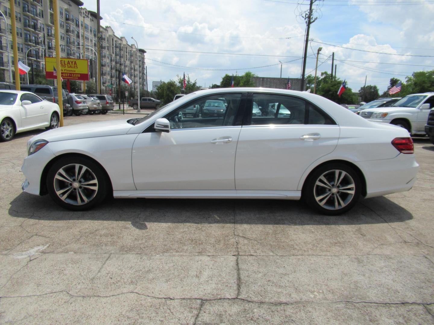 2015 White /Tan Mercedes-Benz E-Class E350 Sport Sedan (WDDHF5KBXFB) with an 3.5L V6 DOHC 24V engine, Automatic transmission, located at 1511 North Shepherd Dr., Houston, TX, 77008, (281) 657-1221, 29.798361, -95.412560 - 2015 MERCEDES-BENZ E-CLASS E 350 VIN: WDDHF5KBXFB117102 W D D H F 5 K B X F B 1 1 7 1 0 2 SEDAN 4 DR 3.5L V6 F DOHC 24V GASOLINE REAR WHEEL DRIVE - Photo#25