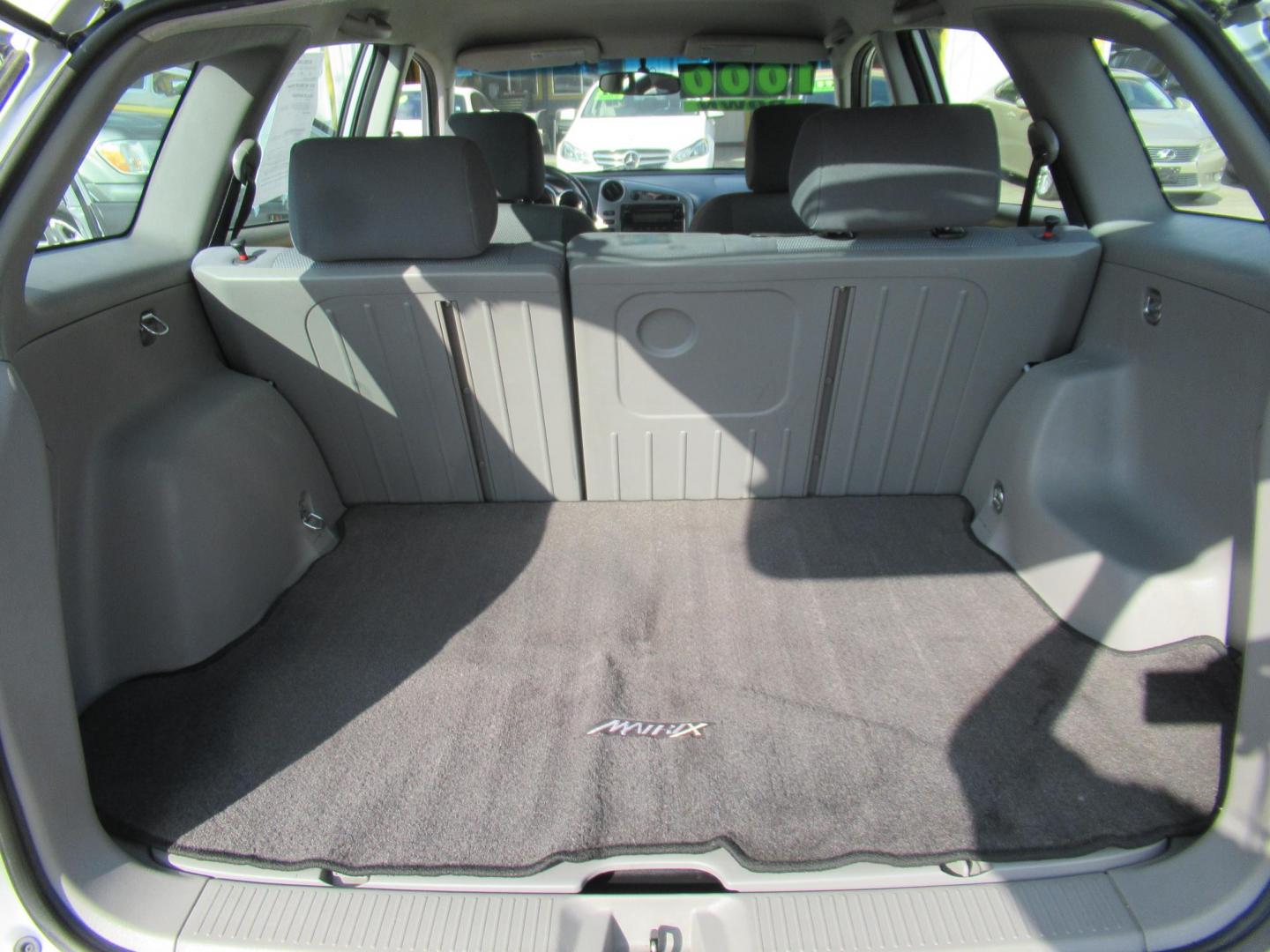 2005 Silver /Black Toyota Matrix 4WD (2T1LR32E25C) with an 1.8L L4 DOHC 16V engine, 4-Speed Automatic Overdrive transmission, located at 1511 North Shepherd Dr., Houston, TX, 77008, (281) 657-1221, 29.798361, -95.412560 - 2005 TOYOTA MATRIX XR VIN: 2T1LR32E25C457693 2 T 1 L R 3 2 E 2 5 C 4 5 7 6 9 3 HATCHBACK 4 DR 1.8L I4 F DOHC 16V GASOLINE ALL WHEEL DRIVE- Photo#7