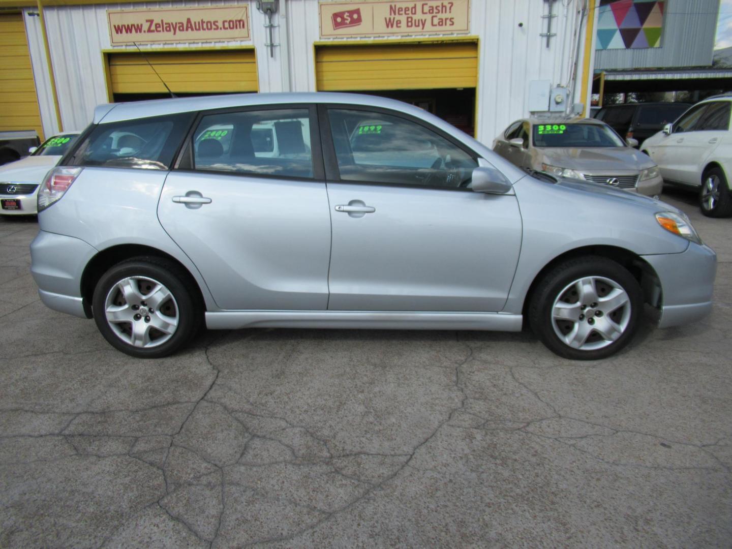 2005 Silver /Black Toyota Matrix 4WD (2T1LR32E25C) with an 1.8L L4 DOHC 16V engine, 4-Speed Automatic Overdrive transmission, located at 1511 North Shepherd Dr., Houston, TX, 77008, (281) 657-1221, 29.798361, -95.412560 - 2005 TOYOTA MATRIX XR VIN: 2T1LR32E25C457693 2 T 1 L R 3 2 E 2 5 C 4 5 7 6 9 3 HATCHBACK 4 DR 1.8L I4 F DOHC 16V GASOLINE ALL WHEEL DRIVE- Photo#16