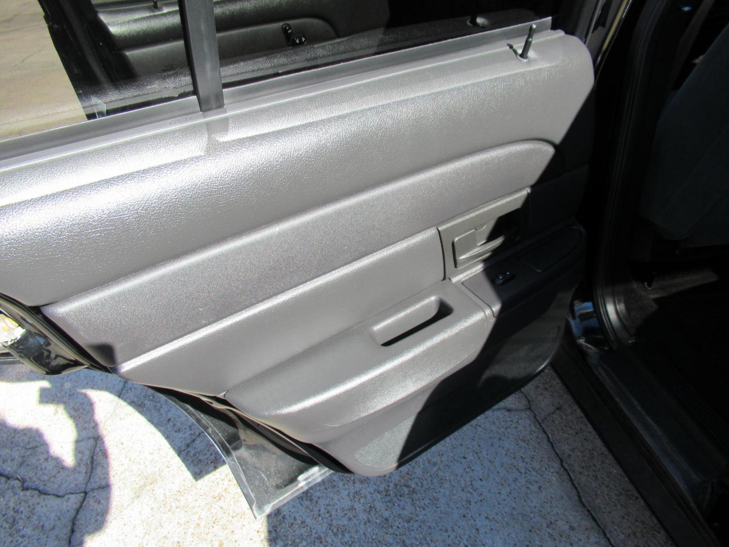 2007 Black /Black Ford Crown Victoria LX (2FAFP74V97X) with an 4.6L V8 SOHC 16V FFV engine, 4-Speed Automatic Overdrive transmission, located at 1511 North Shepherd Dr., Houston, TX, 77008, (281) 657-1221, 29.798361, -95.412560 - 2007 FORD CROWN VICTORIA LX VIN: 2FAFP74V97X111216 2 F A F P 7 4 V 9 7 X 1 1 1 2 1 6 SEDAN 4 DR 4.6L V8 F SOHC FLEX FUEL VERY CLEAN WELL MAINTAINED LOW LOW MILES RUNS GREAT REAR WHEEL DRIVE READY TO DRIVE - Photo#10