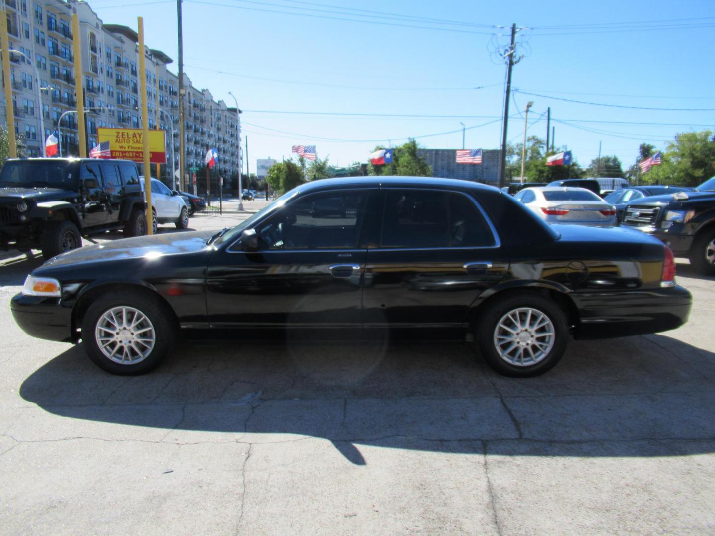 2007 Black /Black Ford Crown Victoria LX (2FAFP74V97X) with an 4.6L V8 SOHC 16V FFV engine, 4-Speed Automatic Overdrive transmission, located at 1511 North Shepherd Dr., Houston, TX, 77008, (281) 657-1221, 29.798361, -95.412560 - 2007 FORD CROWN VICTORIA LX VIN: 2FAFP74V97X111216 2 F A F P 7 4 V 9 7 X 1 1 1 2 1 6 SEDAN 4 DR 4.6L V8 F SOHC FLEX FUEL VERY CLEAN WELL MAINTAINED LOW LOW MILES RUNS GREAT REAR WHEEL DRIVE READY TO DRIVE - Photo#34