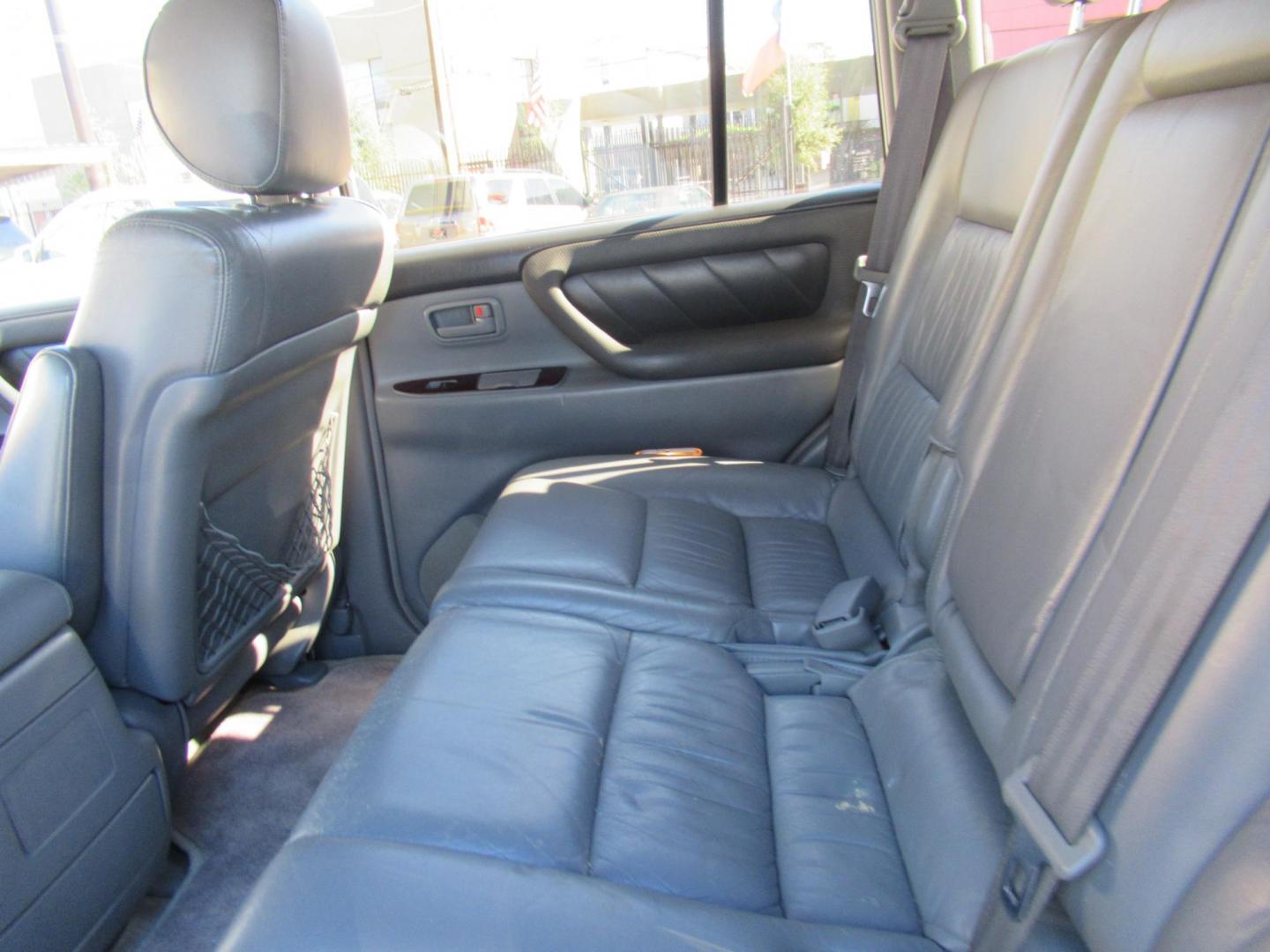 2001 Toyota Land Cruiser 4WD (JTEHT05J112) with an 4.7L V8 SOHC 16V engine, 4-Speed Automatic Overdrive transmission, located at 1511 North Shepherd Dr., Houston, TX, 77008, (281) 657-1221, 29.798361, -95.412560 - 2001 TOYOTA LAND CRUISER VIN: JTEHT05J112007701 J T E H T 0 5 J 1 1 2 0 0 7 7 0 1 4 DOOR WAGON/SPORT UTILITY 4.7L V8 F DOHC 32V GASOLINE ONE OWNER STRONG ENGINE CLEAN INTERIOR RUNS GREAT TRANSMISSION SHIFTS SMOOTH DONT MISS OUT ON THIS NICE LAND CRUISER ALL WHEEL DRIVE CASH OR CASHIERS - Photo#8