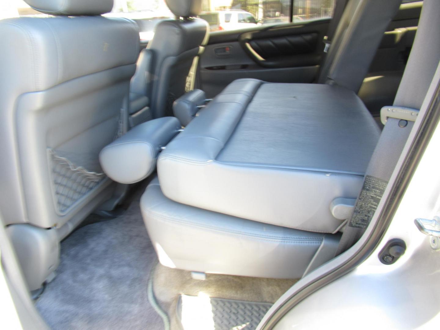 2001 Toyota Land Cruiser 4WD (JTEHT05J112) with an 4.7L V8 SOHC 16V engine, 4-Speed Automatic Overdrive transmission, located at 1511 North Shepherd Dr., Houston, TX, 77008, (281) 657-1221, 29.798361, -95.412560 - 2001 TOYOTA LAND CRUISER VIN: JTEHT05J112007701 J T E H T 0 5 J 1 1 2 0 0 7 7 0 1 4 DOOR WAGON/SPORT UTILITY 4.7L V8 F DOHC 32V GASOLINE ONE OWNER STRONG ENGINE CLEAN INTERIOR RUNS GREAT TRANSMISSION SHIFTS SMOOTH DONT MISS OUT ON THIS NICE LAND CRUISER ALL WHEEL DRIVE CASH OR CASHIERS - Photo#13