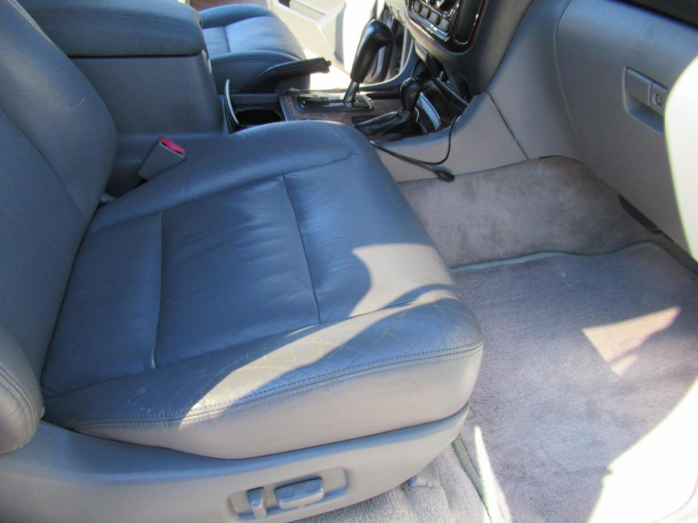 2001 Toyota Land Cruiser 4WD (JTEHT05J112) with an 4.7L V8 SOHC 16V engine, 4-Speed Automatic Overdrive transmission, located at 1511 North Shepherd Dr., Houston, TX, 77008, (281) 657-1221, 29.798361, -95.412560 - 2001 TOYOTA LAND CRUISER VIN: JTEHT05J112007701 J T E H T 0 5 J 1 1 2 0 0 7 7 0 1 4 DOOR WAGON/SPORT UTILITY 4.7L V8 F DOHC 32V GASOLINE ONE OWNER STRONG ENGINE CLEAN INTERIOR RUNS GREAT TRANSMISSION SHIFTS SMOOTH DONT MISS OUT ON THIS NICE LAND CRUISER ALL WHEEL DRIVE CASH OR CASHIERS - Photo#17