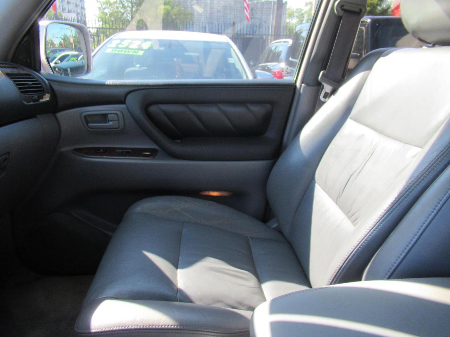 2001 Toyota Land Cruiser 4WD (JTEHT05J112) with an 4.7L V8 SOHC 16V engine, 4-Speed Automatic Overdrive transmission, located at 1511 North Shepherd Dr., Houston, TX, 77008, (281) 657-1221, 29.798361, -95.412560 - 2001 TOYOTA LAND CRUISER VIN: JTEHT05J112007701 J T E H T 0 5 J 1 1 2 0 0 7 7 0 1 4 DOOR WAGON/SPORT UTILITY 4.7L V8 F DOHC 32V GASOLINE ONE OWNER STRONG ENGINE CLEAN INTERIOR RUNS GREAT TRANSMISSION SHIFTS SMOOTH DONT MISS OUT ON THIS NICE LAND CRUISER ALL WHEEL DRIVE CASH OR CASHIERS - Photo#22