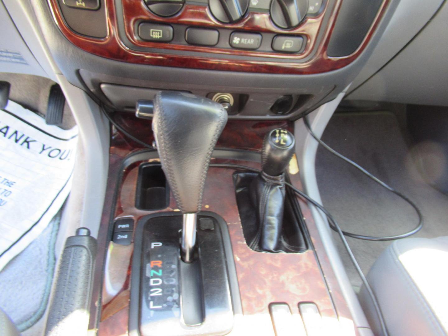 2001 Toyota Land Cruiser 4WD (JTEHT05J112) with an 4.7L V8 SOHC 16V engine, 4-Speed Automatic Overdrive transmission, located at 1511 North Shepherd Dr., Houston, TX, 77008, (281) 657-1221, 29.798361, -95.412560 - 2001 TOYOTA LAND CRUISER VIN: JTEHT05J112007701 J T E H T 0 5 J 1 1 2 0 0 7 7 0 1 4 DOOR WAGON/SPORT UTILITY 4.7L V8 F DOHC 32V GASOLINE ONE OWNER STRONG ENGINE CLEAN INTERIOR RUNS GREAT TRANSMISSION SHIFTS SMOOTH DONT MISS OUT ON THIS NICE LAND CRUISER ALL WHEEL DRIVE CASH OR CASHIERS - Photo#24