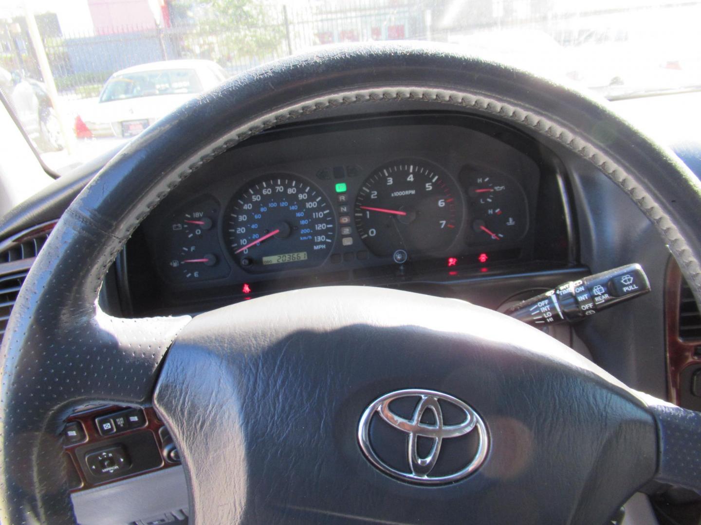 2001 Toyota Land Cruiser 4WD (JTEHT05J112) with an 4.7L V8 SOHC 16V engine, 4-Speed Automatic Overdrive transmission, located at 1511 North Shepherd Dr., Houston, TX, 77008, (281) 657-1221, 29.798361, -95.412560 - 2001 TOYOTA LAND CRUISER VIN: JTEHT05J112007701 J T E H T 0 5 J 1 1 2 0 0 7 7 0 1 4 DOOR WAGON/SPORT UTILITY 4.7L V8 F DOHC 32V GASOLINE ONE OWNER STRONG ENGINE CLEAN INTERIOR RUNS GREAT TRANSMISSION SHIFTS SMOOTH DONT MISS OUT ON THIS NICE LAND CRUISER ALL WHEEL DRIVE CASH OR CASHIERS - Photo#26