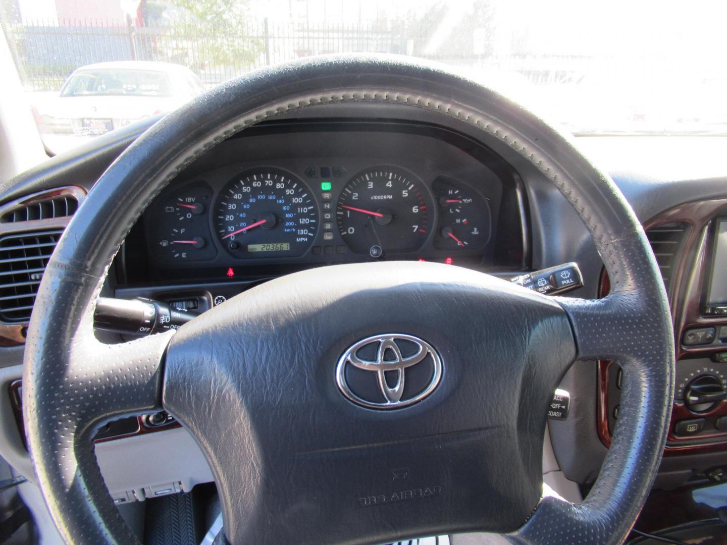 2001 Toyota Land Cruiser 4WD (JTEHT05J112) with an 4.7L V8 SOHC 16V engine, 4-Speed Automatic Overdrive transmission, located at 1511 North Shepherd Dr., Houston, TX, 77008, (281) 657-1221, 29.798361, -95.412560 - 2001 TOYOTA LAND CRUISER VIN: JTEHT05J112007701 J T E H T 0 5 J 1 1 2 0 0 7 7 0 1 4 DOOR WAGON/SPORT UTILITY 4.7L V8 F DOHC 32V GASOLINE ONE OWNER STRONG ENGINE CLEAN INTERIOR RUNS GREAT TRANSMISSION SHIFTS SMOOTH DONT MISS OUT ON THIS NICE LAND CRUISER ALL WHEEL DRIVE CASH OR CASHIERS - Photo#27