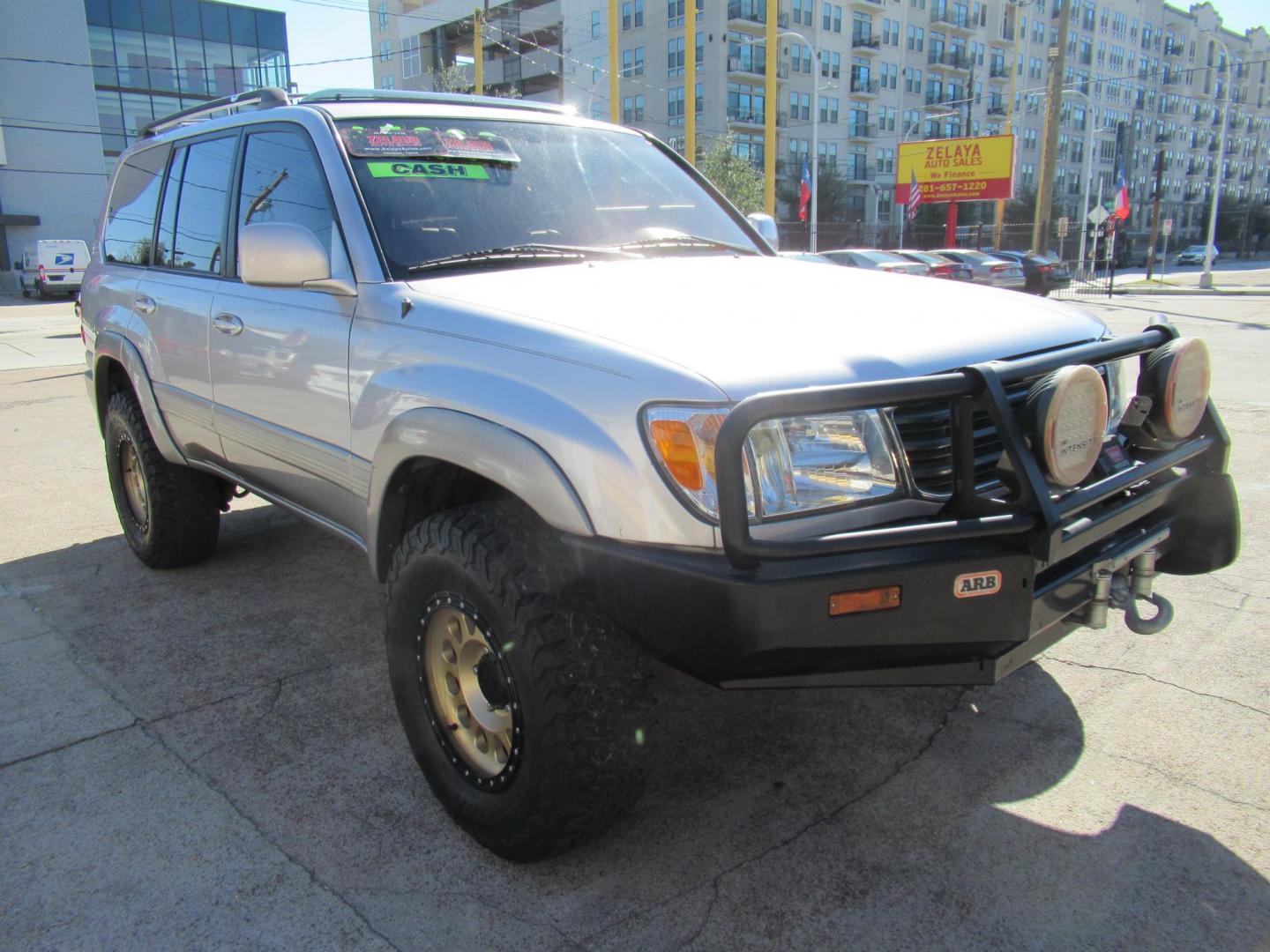 2001 Toyota Land Cruiser 4WD (JTEHT05J112) with an 4.7L V8 SOHC 16V engine, 4-Speed Automatic Overdrive transmission, located at 1511 North Shepherd Dr., Houston, TX, 77008, (281) 657-1221, 29.798361, -95.412560 - 2001 TOYOTA LAND CRUISER VIN: JTEHT05J112007701 J T E H T 0 5 J 1 1 2 0 0 7 7 0 1 4 DOOR WAGON/SPORT UTILITY 4.7L V8 F DOHC 32V GASOLINE ONE OWNER STRONG ENGINE CLEAN INTERIOR RUNS GREAT TRANSMISSION SHIFTS SMOOTH DONT MISS OUT ON THIS NICE LAND CRUISER ALL WHEEL DRIVE CASH OR CASHIERS - Photo#33