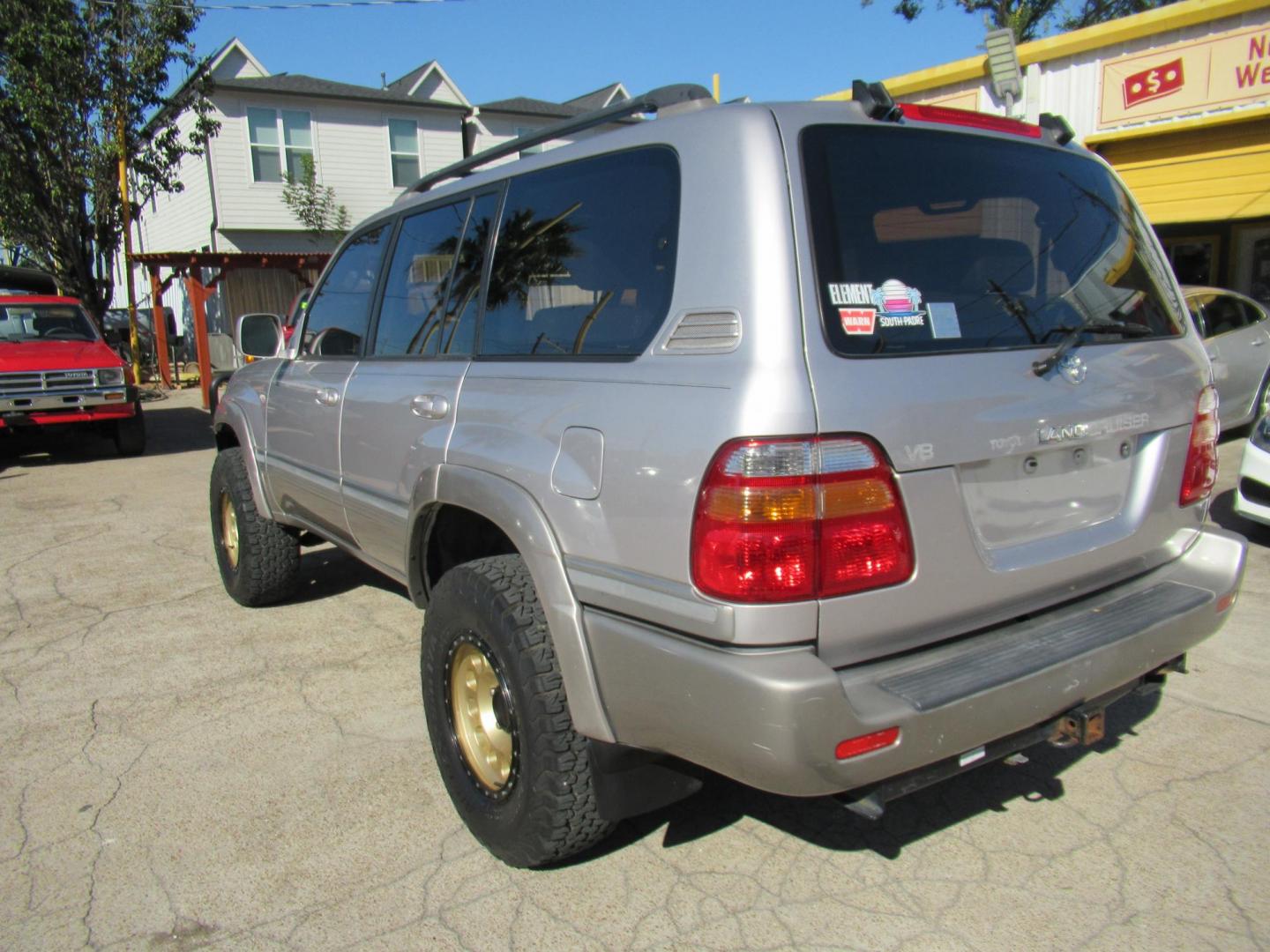 2001 Toyota Land Cruiser 4WD (JTEHT05J112) with an 4.7L V8 SOHC 16V engine, 4-Speed Automatic Overdrive transmission, located at 1511 North Shepherd Dr., Houston, TX, 77008, (281) 657-1221, 29.798361, -95.412560 - 2001 TOYOTA LAND CRUISER VIN: JTEHT05J112007701 J T E H T 0 5 J 1 1 2 0 0 7 7 0 1 4 DOOR WAGON/SPORT UTILITY 4.7L V8 F DOHC 32V GASOLINE ONE OWNER STRONG ENGINE CLEAN INTERIOR RUNS GREAT TRANSMISSION SHIFTS SMOOTH DONT MISS OUT ON THIS NICE LAND CRUISER ALL WHEEL DRIVE CASH OR CASHIERS - Photo#37