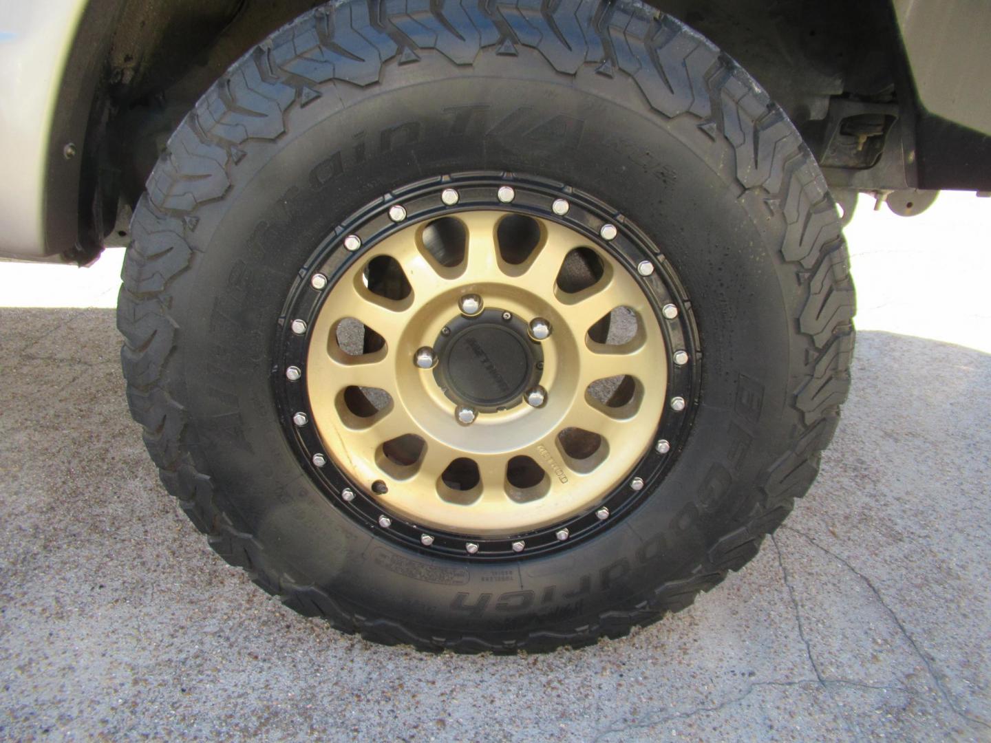 2001 Toyota Land Cruiser 4WD (JTEHT05J112) with an 4.7L V8 SOHC 16V engine, 4-Speed Automatic Overdrive transmission, located at 1511 North Shepherd Dr., Houston, TX, 77008, (281) 657-1221, 29.798361, -95.412560 - 2001 TOYOTA LAND CRUISER VIN: JTEHT05J112007701 J T E H T 0 5 J 1 1 2 0 0 7 7 0 1 4 DOOR WAGON/SPORT UTILITY 4.7L V8 F DOHC 32V GASOLINE ONE OWNER STRONG ENGINE CLEAN INTERIOR RUNS GREAT TRANSMISSION SHIFTS SMOOTH DONT MISS OUT ON THIS NICE LAND CRUISER ALL WHEEL DRIVE CASH OR CASHIERS - Photo#47