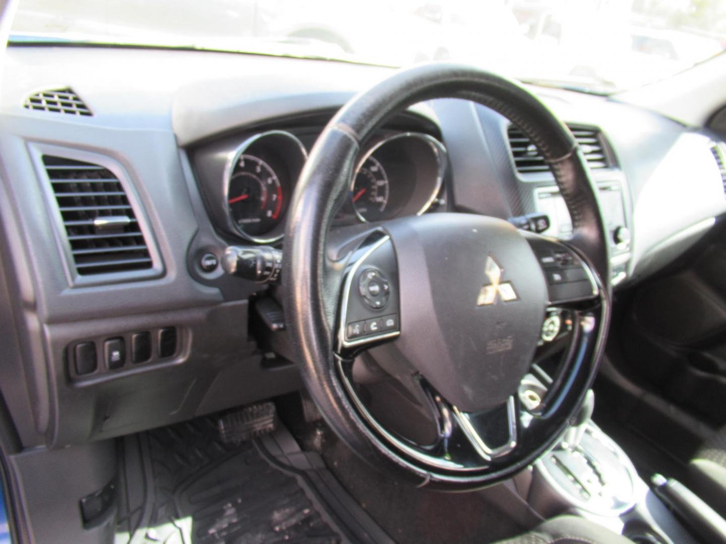 2016 BLUE /Black Mitsubishi Outlander Sport 2.4 ES CVT (JA4AP3AW9GZ) with an 2.4L L4 DOHC 16V engine, CVT transmission, located at 1511 North Shepherd Dr., Houston, TX, 77008, (281) 657-1221, 29.798361, -95.412560 - 2016 MITSUBISHI OUTLANDER SPORT 2.4 ES VIN: JA4AP3AW9GZ043787 J A 4 A P 3 A W 9 G Z 0 4 3 7 8 7 4 DOOR WAGON/SPORT UTILITY 2.4L I4 F DOHC 16V GASOLINE FRONT WHEEL DRIVE - Photo#5