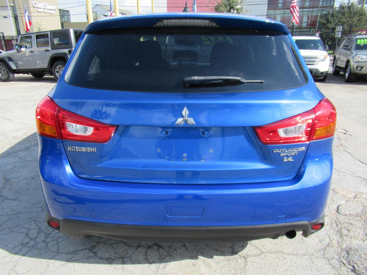 2016 BLUE /Black Mitsubishi Outlander Sport 2.4 ES CVT (JA4AP3AW9GZ) with an 2.4L L4 DOHC 16V engine, CVT transmission, located at 1511 North Shepherd Dr., Houston, TX, 77008, (281) 657-1221, 29.798361, -95.412560 - 2016 MITSUBISHI OUTLANDER SPORT 2.4 ES VIN: JA4AP3AW9GZ043787 J A 4 A P 3 A W 9 G Z 0 4 3 7 8 7 4 DOOR WAGON/SPORT UTILITY 2.4L I4 F DOHC 16V GASOLINE FRONT WHEEL DRIVE - Photo#9