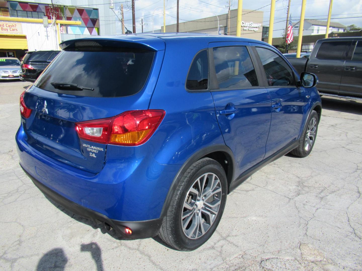 2016 BLUE /Black Mitsubishi Outlander Sport 2.4 ES CVT (JA4AP3AW9GZ) with an 2.4L L4 DOHC 16V engine, CVT transmission, located at 1511 North Shepherd Dr., Houston, TX, 77008, (281) 657-1221, 29.798361, -95.412560 - 2016 MITSUBISHI OUTLANDER SPORT 2.4 ES VIN: JA4AP3AW9GZ043787 J A 4 A P 3 A W 9 G Z 0 4 3 7 8 7 4 DOOR WAGON/SPORT UTILITY 2.4L I4 F DOHC 16V GASOLINE FRONT WHEEL DRIVE - Photo#10