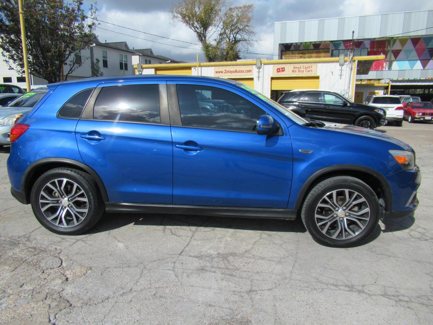 2016 BLUE /Black Mitsubishi Outlander Sport 2.4 ES CVT (JA4AP3AW9GZ) with an 2.4L L4 DOHC 16V engine, CVT transmission, located at 1511 North Shepherd Dr., Houston, TX, 77008, (281) 657-1221, 29.798361, -95.412560 - 2016 MITSUBISHI OUTLANDER SPORT 2.4 ES VIN: JA4AP3AW9GZ043787 J A 4 A P 3 A W 9 G Z 0 4 3 7 8 7 4 DOOR WAGON/SPORT UTILITY 2.4L I4 F DOHC 16V GASOLINE FRONT WHEEL DRIVE - Photo#11