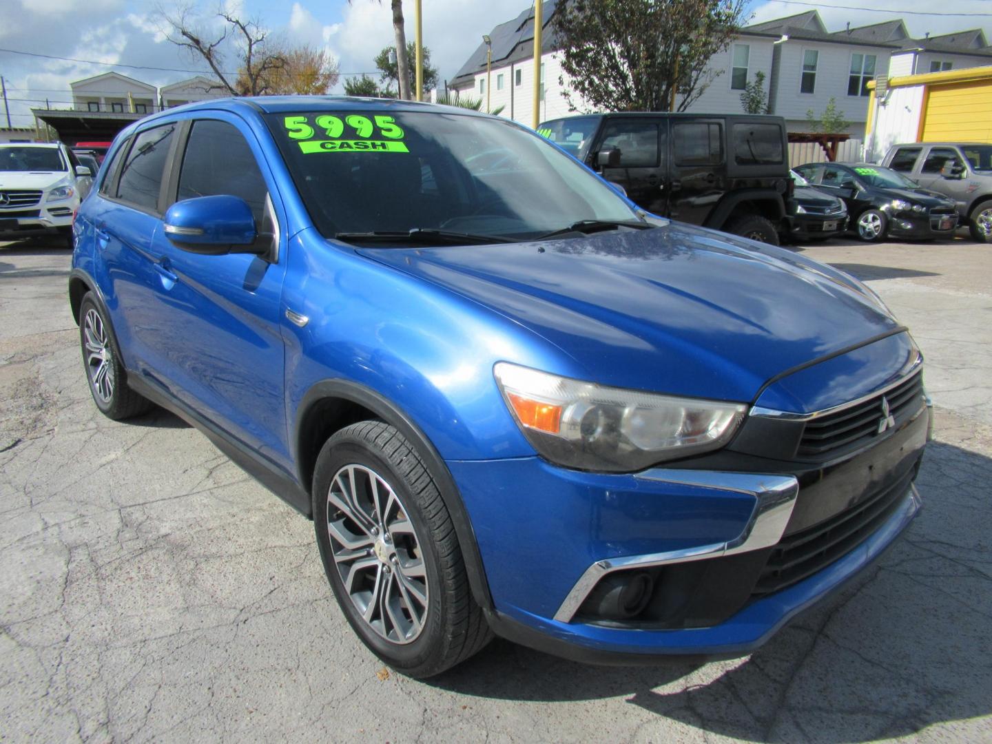 2016 BLUE /Black Mitsubishi Outlander Sport 2.4 ES CVT (JA4AP3AW9GZ) with an 2.4L L4 DOHC 16V engine, CVT transmission, located at 1511 North Shepherd Dr., Houston, TX, 77008, (281) 657-1221, 29.798361, -95.412560 - 2016 MITSUBISHI OUTLANDER SPORT 2.4 ES VIN: JA4AP3AW9GZ043787 J A 4 A P 3 A W 9 G Z 0 4 3 7 8 7 4 DOOR WAGON/SPORT UTILITY 2.4L I4 F DOHC 16V GASOLINE FRONT WHEEL DRIVE - Photo#12