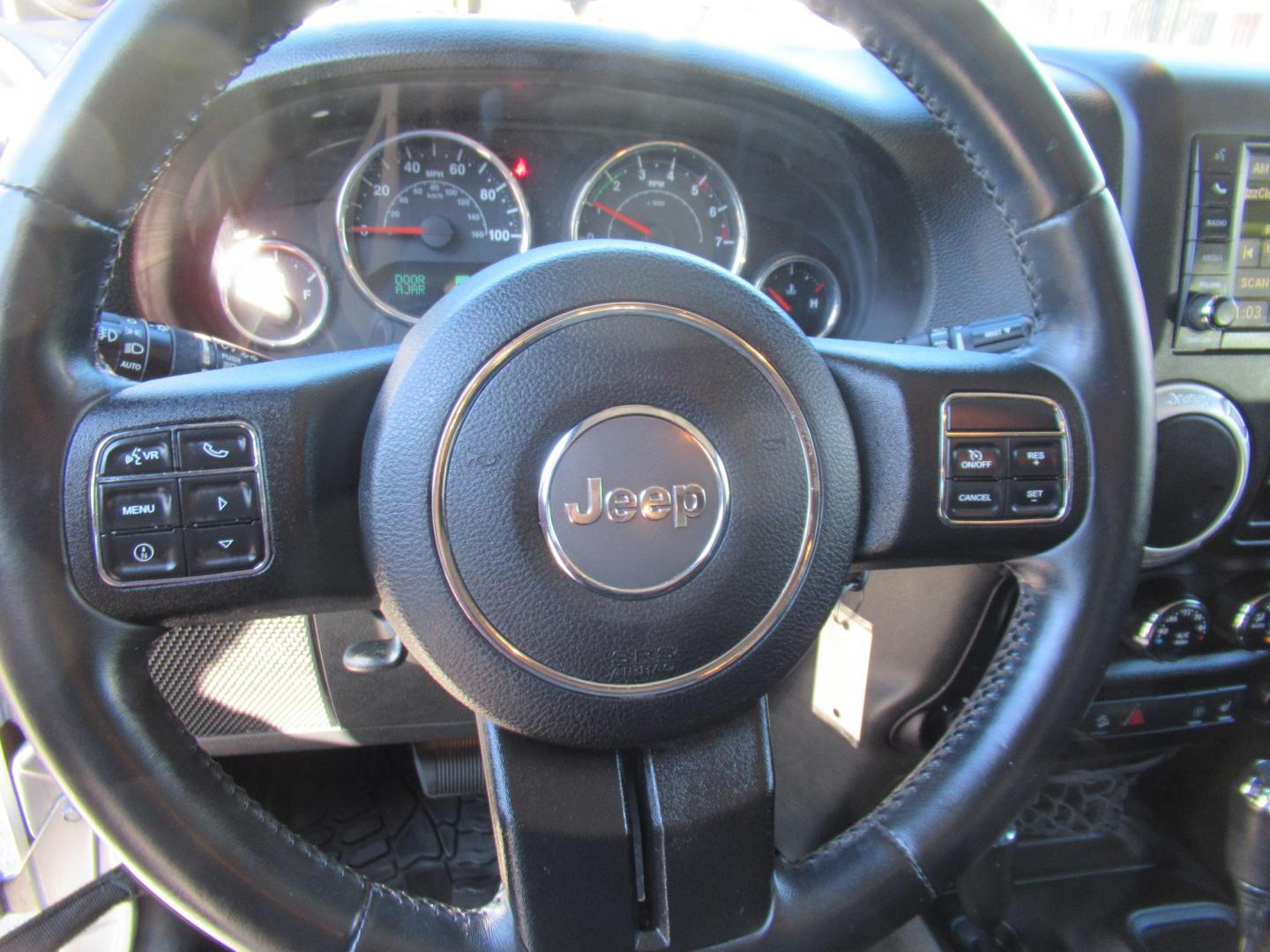 2014 Silver /Black Jeep Wrangler Unlimited Rubicon 4WD (1C4BJWFG2EL) with an 3.6L V6 DOHC 24V FFV engine, Automatic transmission, located at 1511 North Shepherd Dr., Houston, TX, 77008, (281) 657-1221, 29.798361, -95.412560 - 2014 JEEP WRANGLER UNLIMITED RUBICON VIN: 1C4BJWFG2EL325106 1 C 4 B J W F G 2 E L 3 2 5 1 0 6 4 DOOR WAGON/SPORT UTILITY 3.6L V6 F DOHC 24V GASOLINE REAR WHEEL DRIVE W/ 4X4 - Photo#1