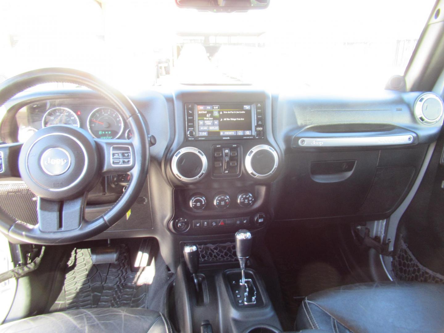 2014 Silver /Black Jeep Wrangler Unlimited Rubicon 4WD (1C4BJWFG2EL) with an 3.6L V6 DOHC 24V FFV engine, Automatic transmission, located at 1511 North Shepherd Dr., Houston, TX, 77008, (281) 657-1221, 29.798361, -95.412560 - 2014 JEEP WRANGLER UNLIMITED RUBICON VIN: 1C4BJWFG2EL325106 1 C 4 B J W F G 2 E L 3 2 5 1 0 6 4 DOOR WAGON/SPORT UTILITY 3.6L V6 F DOHC 24V GASOLINE REAR WHEEL DRIVE W/ 4X4 - Photo#12