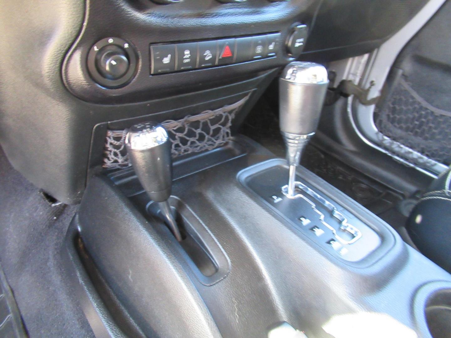 2014 Silver /Black Jeep Wrangler Unlimited Rubicon 4WD (1C4BJWFG2EL) with an 3.6L V6 DOHC 24V FFV engine, Automatic transmission, located at 1511 North Shepherd Dr., Houston, TX, 77008, (281) 657-1221, 29.798361, -95.412560 - 2014 JEEP WRANGLER UNLIMITED RUBICON VIN: 1C4BJWFG2EL325106 1 C 4 B J W F G 2 E L 3 2 5 1 0 6 4 DOOR WAGON/SPORT UTILITY 3.6L V6 F DOHC 24V GASOLINE REAR WHEEL DRIVE W/ 4X4 - Photo#26