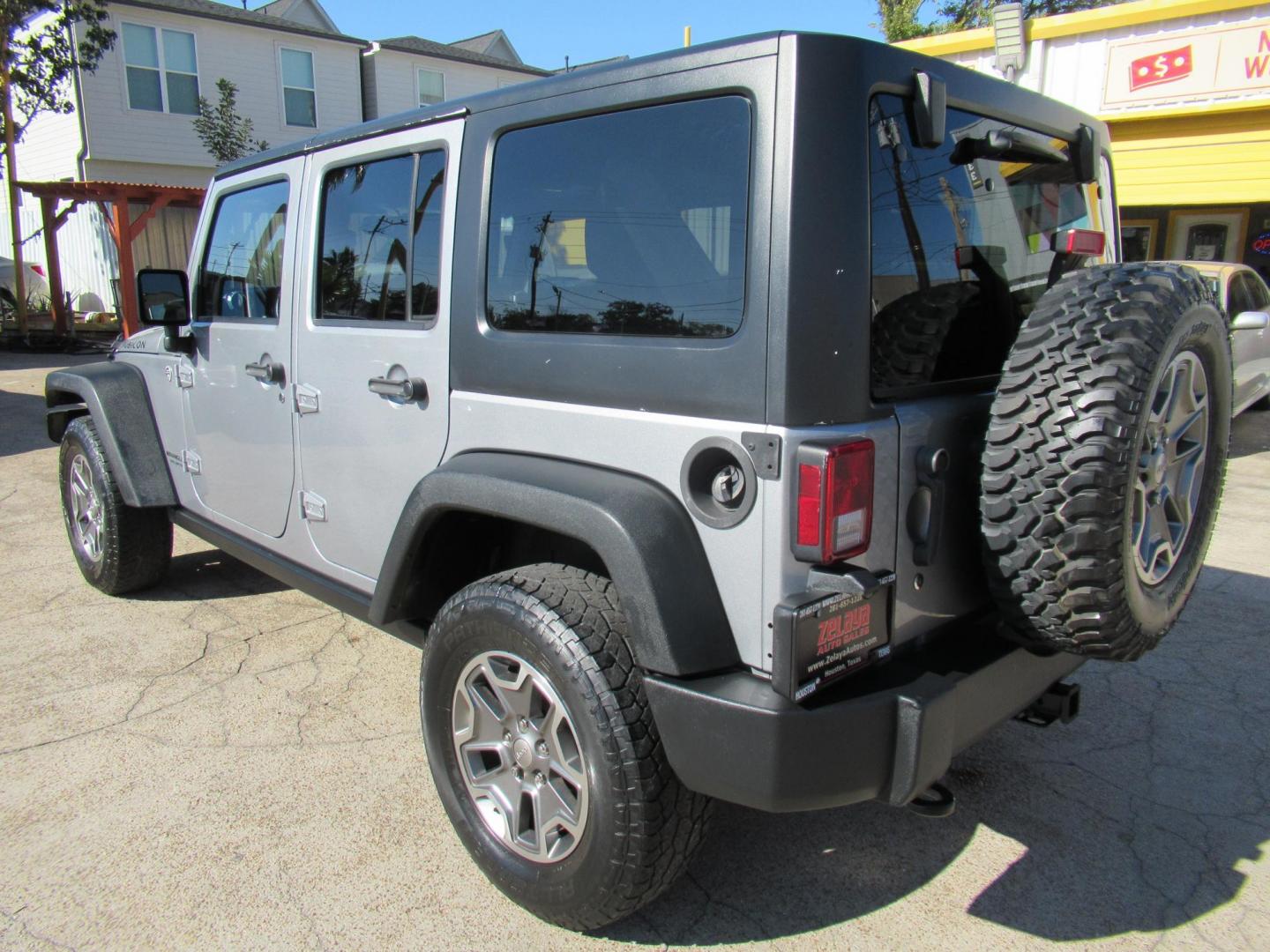 2014 Silver /Black Jeep Wrangler Unlimited Rubicon 4WD (1C4BJWFG2EL) with an 3.6L V6 DOHC 24V FFV engine, Automatic transmission, located at 1511 North Shepherd Dr., Houston, TX, 77008, (281) 657-1221, 29.798361, -95.412560 - 2014 JEEP WRANGLER UNLIMITED RUBICON VIN: 1C4BJWFG2EL325106 1 C 4 B J W F G 2 E L 3 2 5 1 0 6 4 DOOR WAGON/SPORT UTILITY 3.6L V6 F DOHC 24V GASOLINE REAR WHEEL DRIVE W/ 4X4 - Photo#29