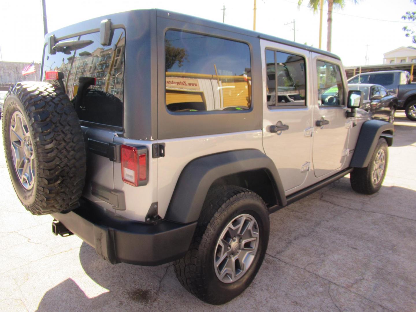 2014 Silver /Black Jeep Wrangler Unlimited Rubicon 4WD (1C4BJWFG2EL) with an 3.6L V6 DOHC 24V FFV engine, Automatic transmission, located at 1511 North Shepherd Dr., Houston, TX, 77008, (281) 657-1221, 29.798361, -95.412560 - 2014 JEEP WRANGLER UNLIMITED RUBICON VIN: 1C4BJWFG2EL325106 1 C 4 B J W F G 2 E L 3 2 5 1 0 6 4 DOOR WAGON/SPORT UTILITY 3.6L V6 F DOHC 24V GASOLINE REAR WHEEL DRIVE W/ 4X4 - Photo#31