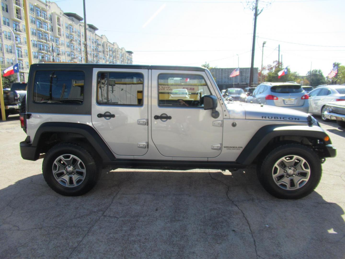 2014 Silver /Black Jeep Wrangler Unlimited Rubicon 4WD (1C4BJWFG2EL) with an 3.6L V6 DOHC 24V FFV engine, Automatic transmission, located at 1511 North Shepherd Dr., Houston, TX, 77008, (281) 657-1221, 29.798361, -95.412560 - 2014 JEEP WRANGLER UNLIMITED RUBICON VIN: 1C4BJWFG2EL325106 1 C 4 B J W F G 2 E L 3 2 5 1 0 6 4 DOOR WAGON/SPORT UTILITY 3.6L V6 F DOHC 24V GASOLINE REAR WHEEL DRIVE W/ 4X4 - Photo#32