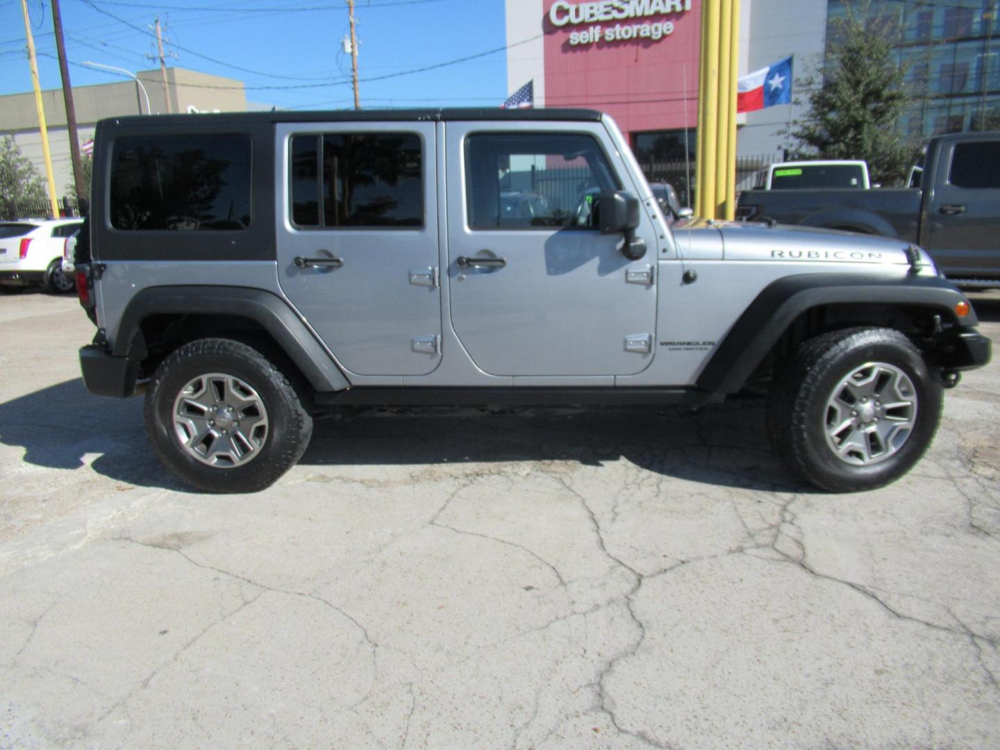 2014 Silver /Black Jeep Wrangler Unlimited Rubicon 4WD (1C4BJWFG2EL) with an 3.6L V6 DOHC 24V FFV engine, Automatic transmission, located at 1511 North Shepherd Dr., Houston, TX, 77008, (281) 657-1221, 29.798361, -95.412560 - 2014 JEEP WRANGLER UNLIMITED RUBICON VIN: 1C4BJWFG2EL325106 1 C 4 B J W F G 2 E L 3 2 5 1 0 6 4 DOOR WAGON/SPORT UTILITY 3.6L V6 F DOHC 24V GASOLINE REAR WHEEL DRIVE W/ 4X4 - Photo#37
