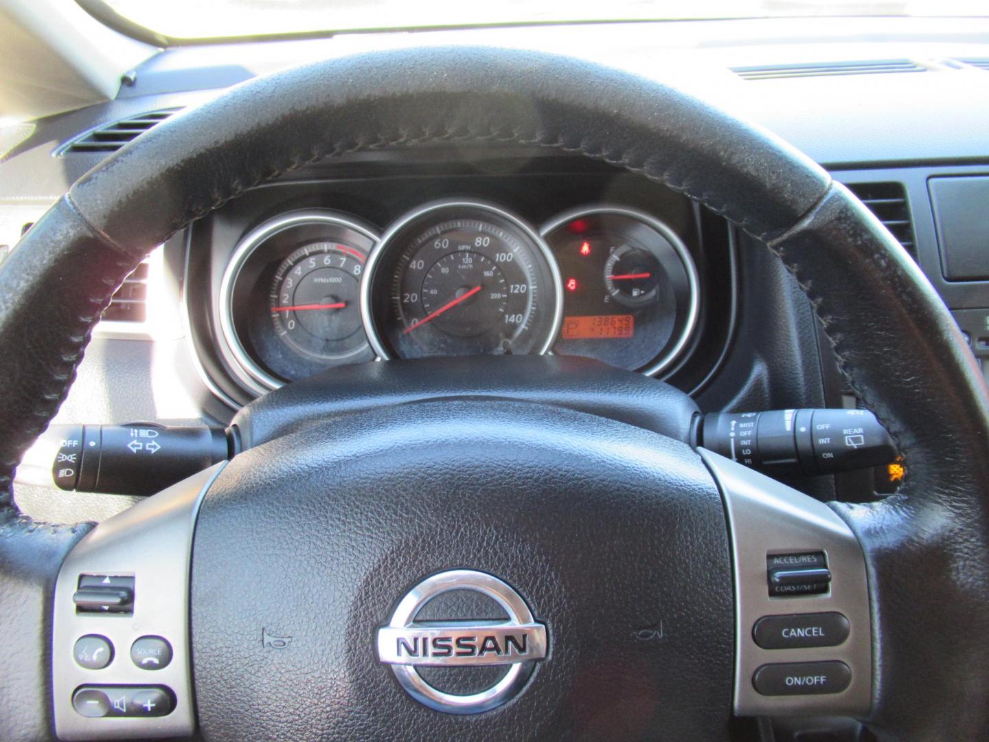 2012 Black /Black Nissan Versa 1.8 SL Hatchback (3N1BC1CP0CK) with an 1.8L L4 DOHC 16V engine, Continuously Variable Transmission transmission, located at 1511 North Shepherd Dr., Houston, TX, 77008, (281) 657-1221, 29.798361, -95.412560 - 2012 NISSAN VERSA 1.8 S VIN: 3N1BC1CP0CK257268 3 N 1 B C 1 C P 0 C K 2 5 7 2 6 8 HATCHBACK 4 DR 1.8L I4 F DOHC 16V GASOLINE FRONT WHEEL DRIVE - Photo#2