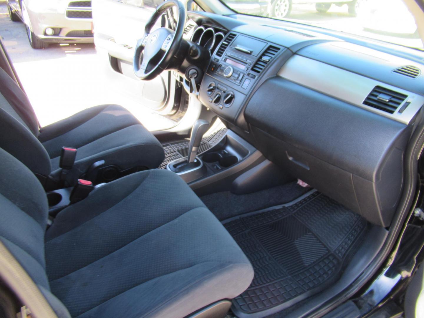 2012 Black /Black Nissan Versa 1.8 SL Hatchback (3N1BC1CP0CK) with an 1.8L L4 DOHC 16V engine, Continuously Variable Transmission transmission, located at 1511 North Shepherd Dr., Houston, TX, 77008, (281) 657-1221, 29.798361, -95.412560 - 2012 NISSAN VERSA 1.8 S VIN: 3N1BC1CP0CK257268 3 N 1 B C 1 C P 0 C K 2 5 7 2 6 8 HATCHBACK 4 DR 1.8L I4 F DOHC 16V GASOLINE FRONT WHEEL DRIVE - Photo#11