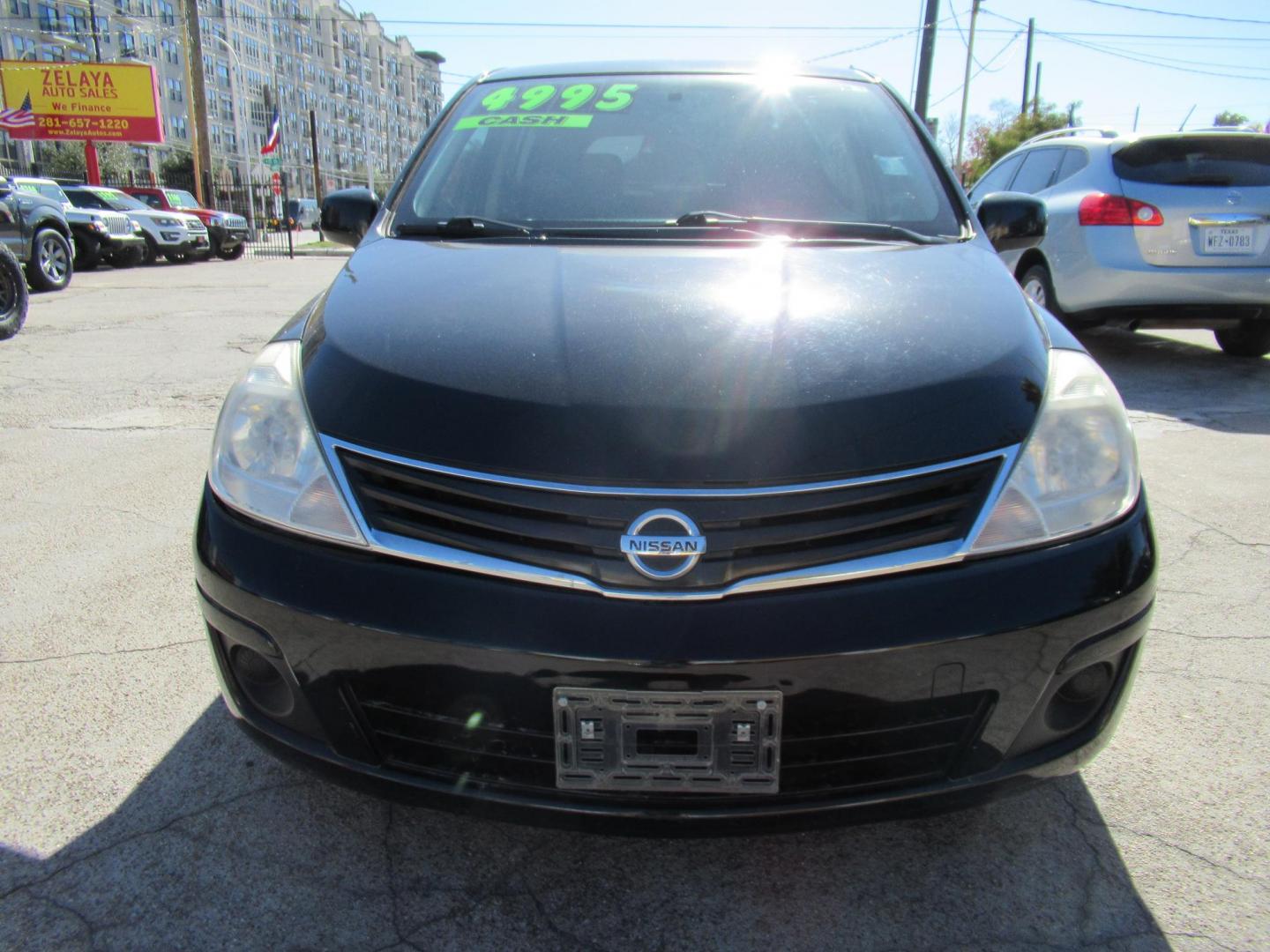 2012 Black /Black Nissan Versa 1.8 SL Hatchback (3N1BC1CP0CK) with an 1.8L L4 DOHC 16V engine, Continuously Variable Transmission transmission, located at 1511 North Shepherd Dr., Houston, TX, 77008, (281) 657-1221, 29.798361, -95.412560 - 2012 NISSAN VERSA 1.8 S VIN: 3N1BC1CP0CK257268 3 N 1 B C 1 C P 0 C K 2 5 7 2 6 8 HATCHBACK 4 DR 1.8L I4 F DOHC 16V GASOLINE FRONT WHEEL DRIVE - Photo#18