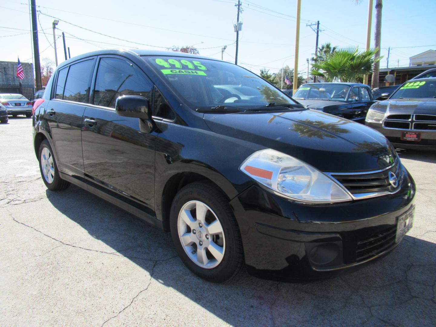 2012 Black /Black Nissan Versa 1.8 SL Hatchback (3N1BC1CP0CK) with an 1.8L L4 DOHC 16V engine, Continuously Variable Transmission transmission, located at 1511 North Shepherd Dr., Houston, TX, 77008, (281) 657-1221, 29.798361, -95.412560 - 2012 NISSAN VERSA 1.8 S VIN: 3N1BC1CP0CK257268 3 N 1 B C 1 C P 0 C K 2 5 7 2 6 8 HATCHBACK 4 DR 1.8L I4 F DOHC 16V GASOLINE FRONT WHEEL DRIVE - Photo#19